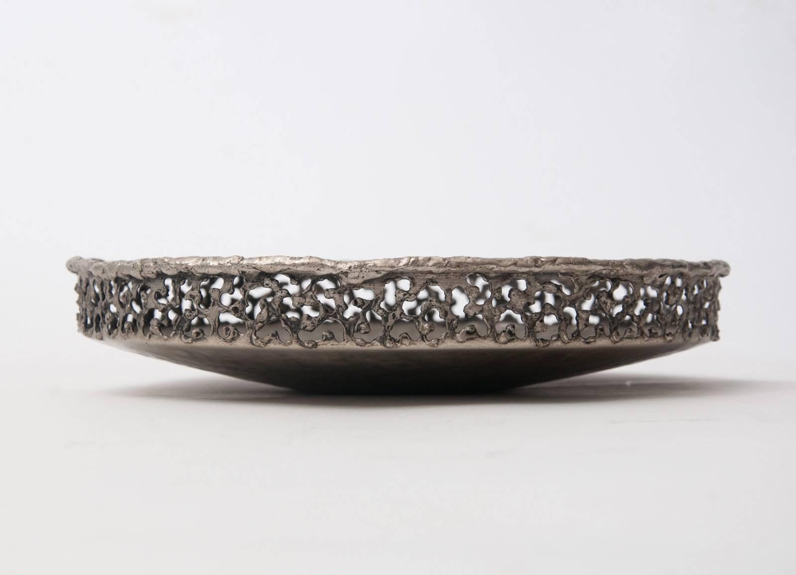 Mid-century Marcello Fantoni Brutalist hammered metal torch cut shallow bowl… Stamped twice “Fantoni Firenze Italy,” 1950s.