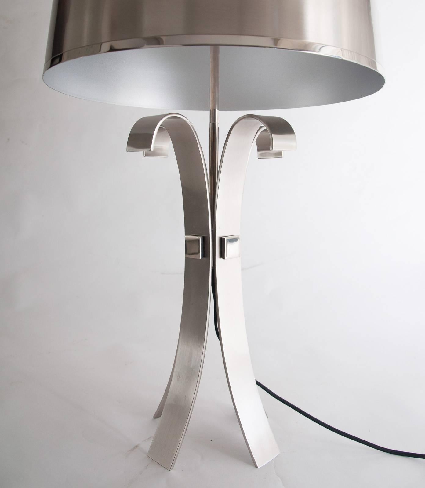 Corolle table lamp in brushed and stainless steel
designed by Jacques Charles in the 1970s Ex Charles showroom model, circa 2010.

Provenance: Maison Charles.