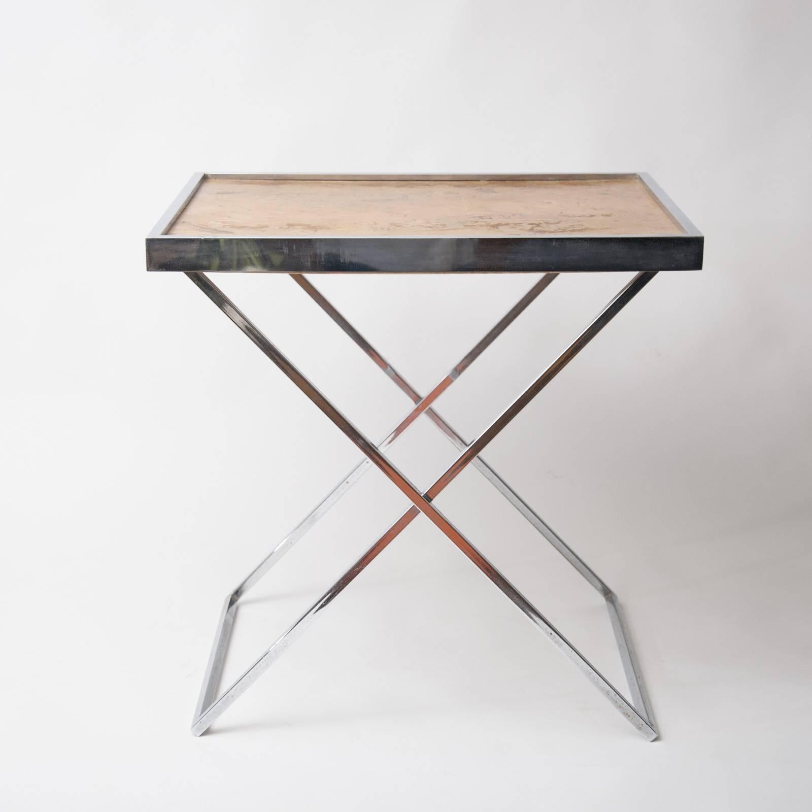 Simple and stylish chrome and burr walnut (?) tray table. Tray can be removed from the X-frame base, Italy, circa 1970 (made in Italy label to the underside of the tray).