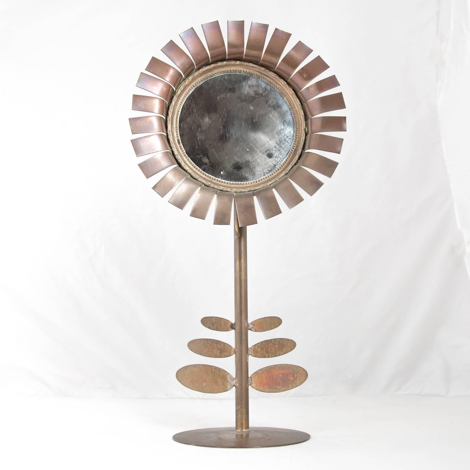 Charming 1970s brass “Daisy” mirror by Chaty, Vallauris, France.