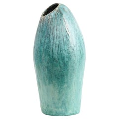 Vase en céramique asymétrique à la glaçure turquoise, signé Marcello Fantoni (1915-2011)