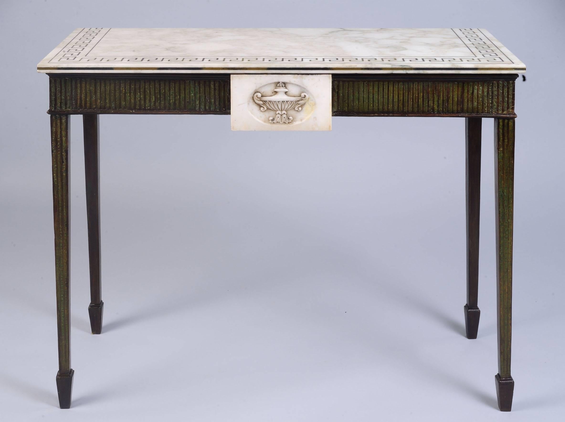 A rare pair of Adam Period Scagliola console tables with marble plaques and marble tops.
United Kingdom, circa 1775-1800.
Measures: 32.5