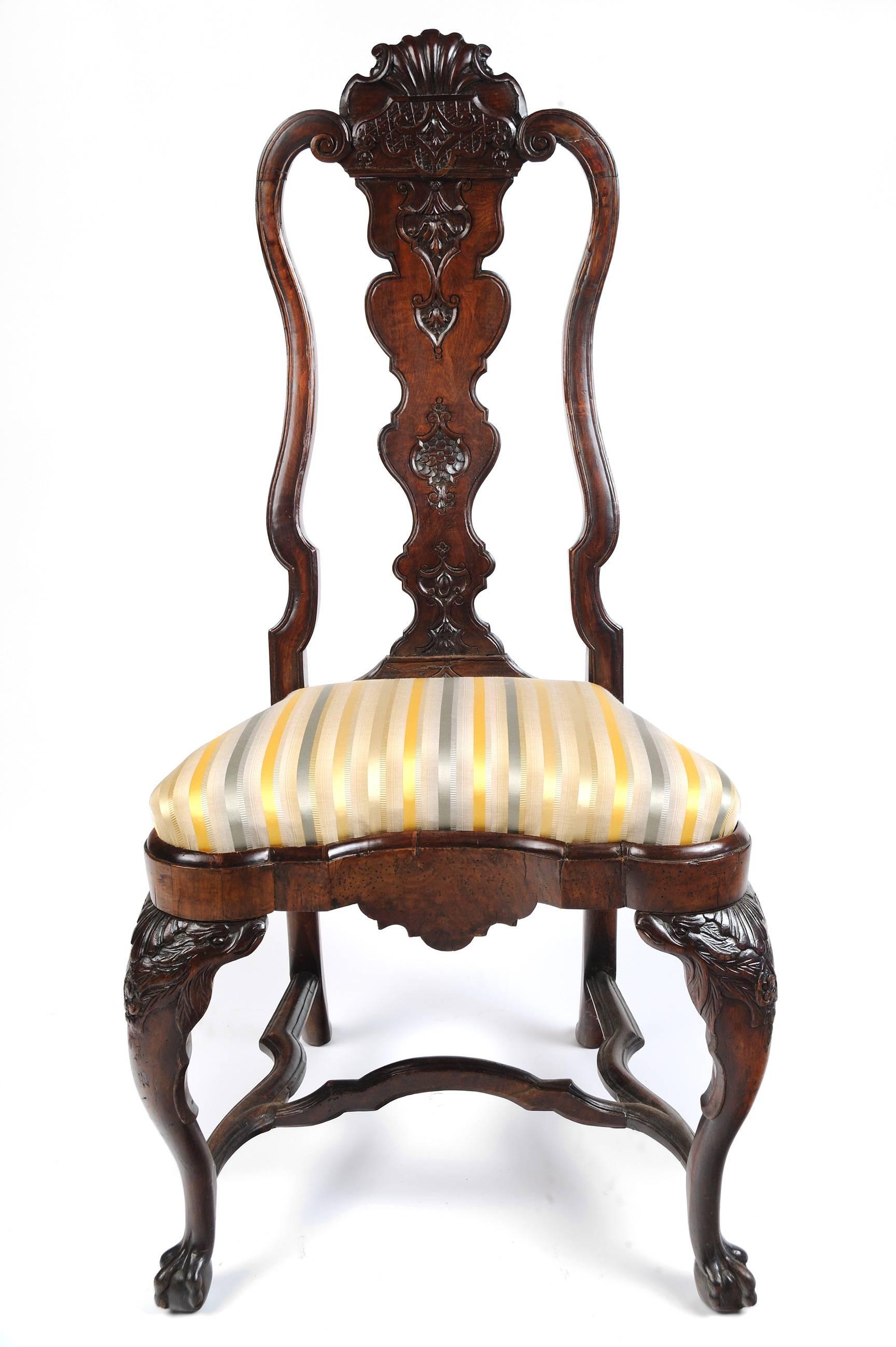 Portuguese Rococo walnut side chair
Portugal, circa 1745 
Carved walnut 
Measures: 45
