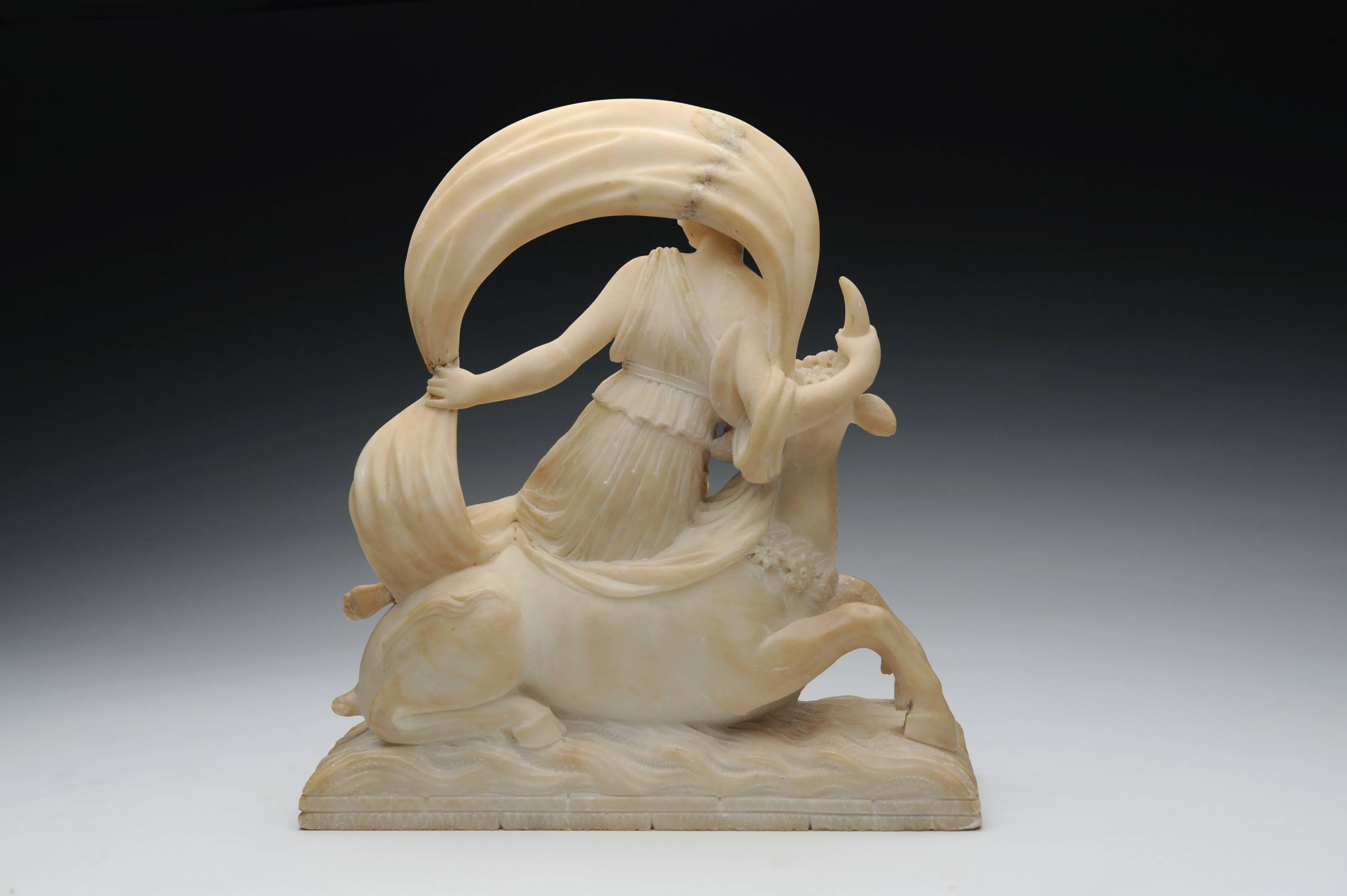 19th century Alabaster Biedermeier sculpture of Europa and the bull, circa 1830
Measures: 11 in.H x 10.6 in.W x 3.6 in.D 
28 cm H x 27 cm W x 9 cm D 

The mythographers tell that Zeus was enamored of Europa and decided to seduce or ravish her,