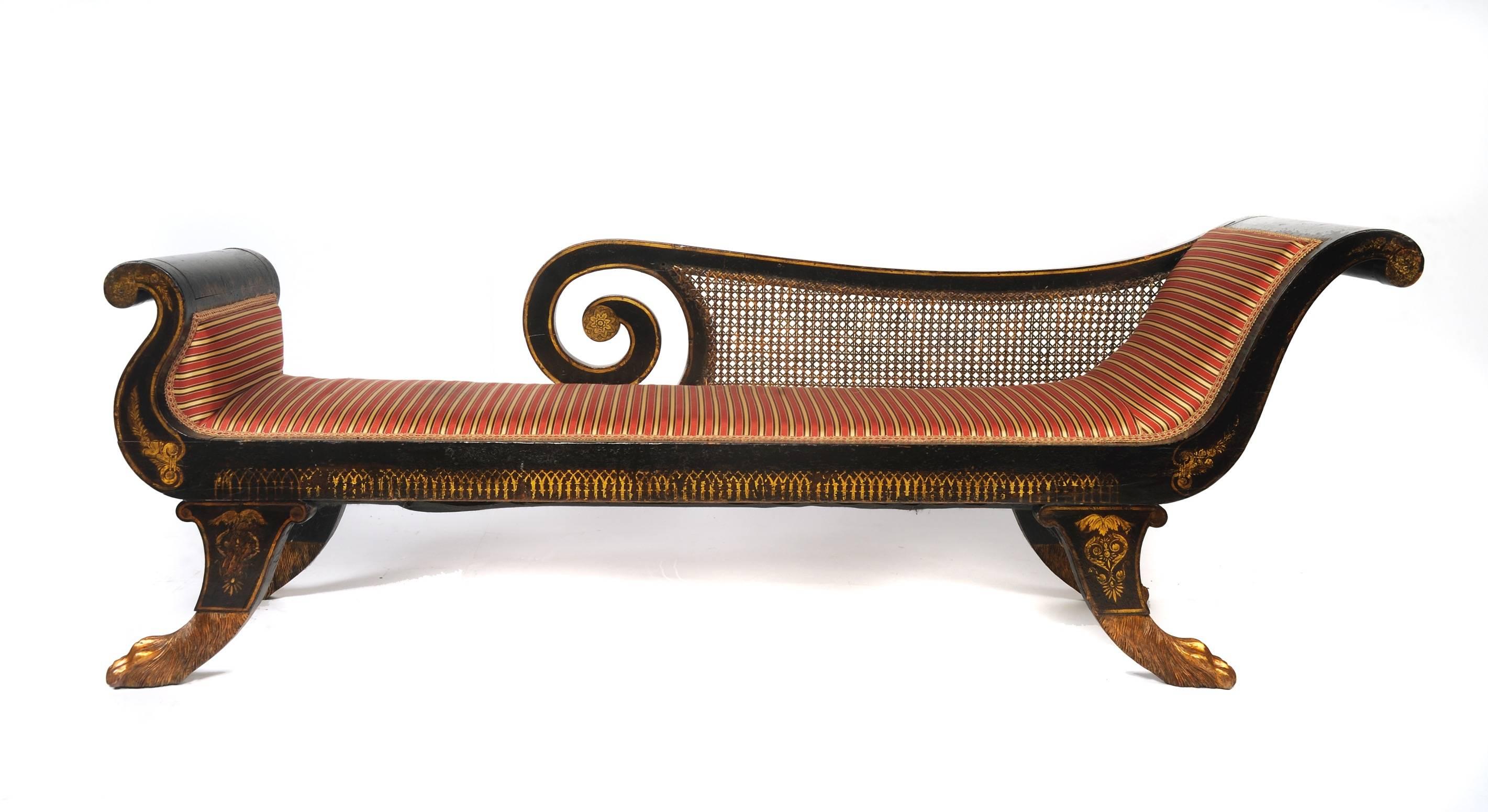 Classical Grecian Style, Caned, Painted and Gilt Stenciled Recamier, Pennsylvania Federal, c. 1820-30.  The remaining paint and stenciling as well as the ornately carved lion's paw feet are highly accomplished.  The entirety of this recaimer is made
