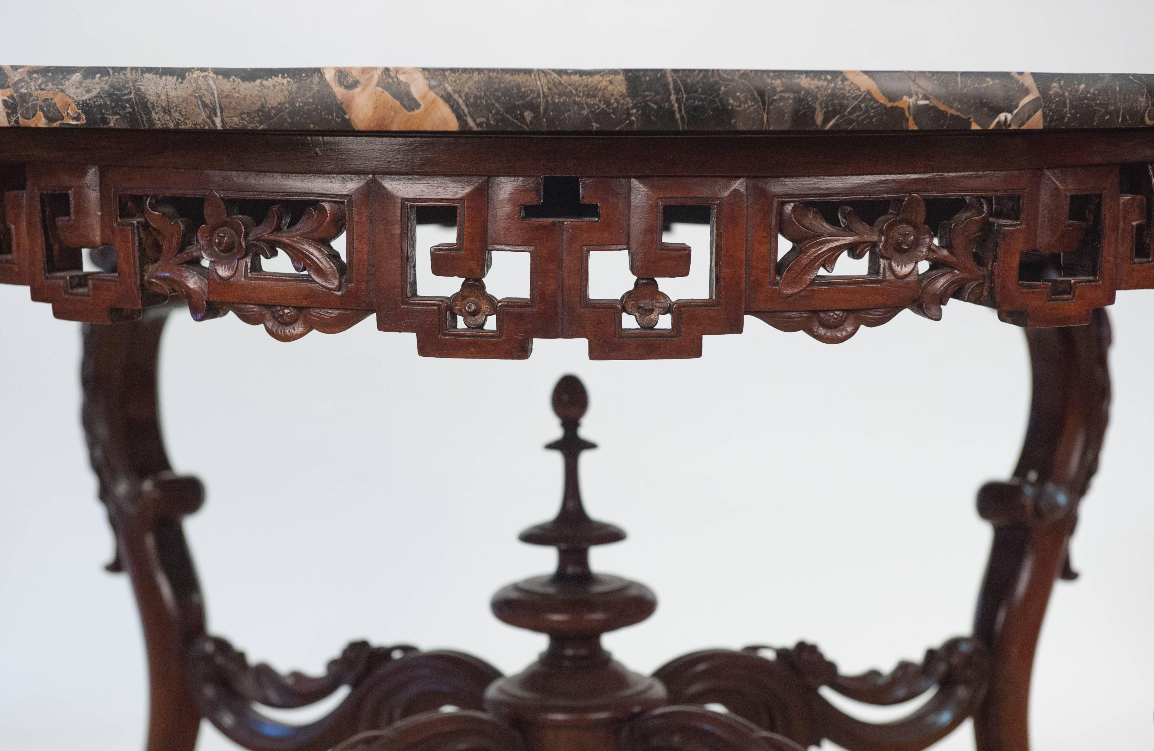 Carved 19th Century Chinese Table in the European Tradition with Marble Top