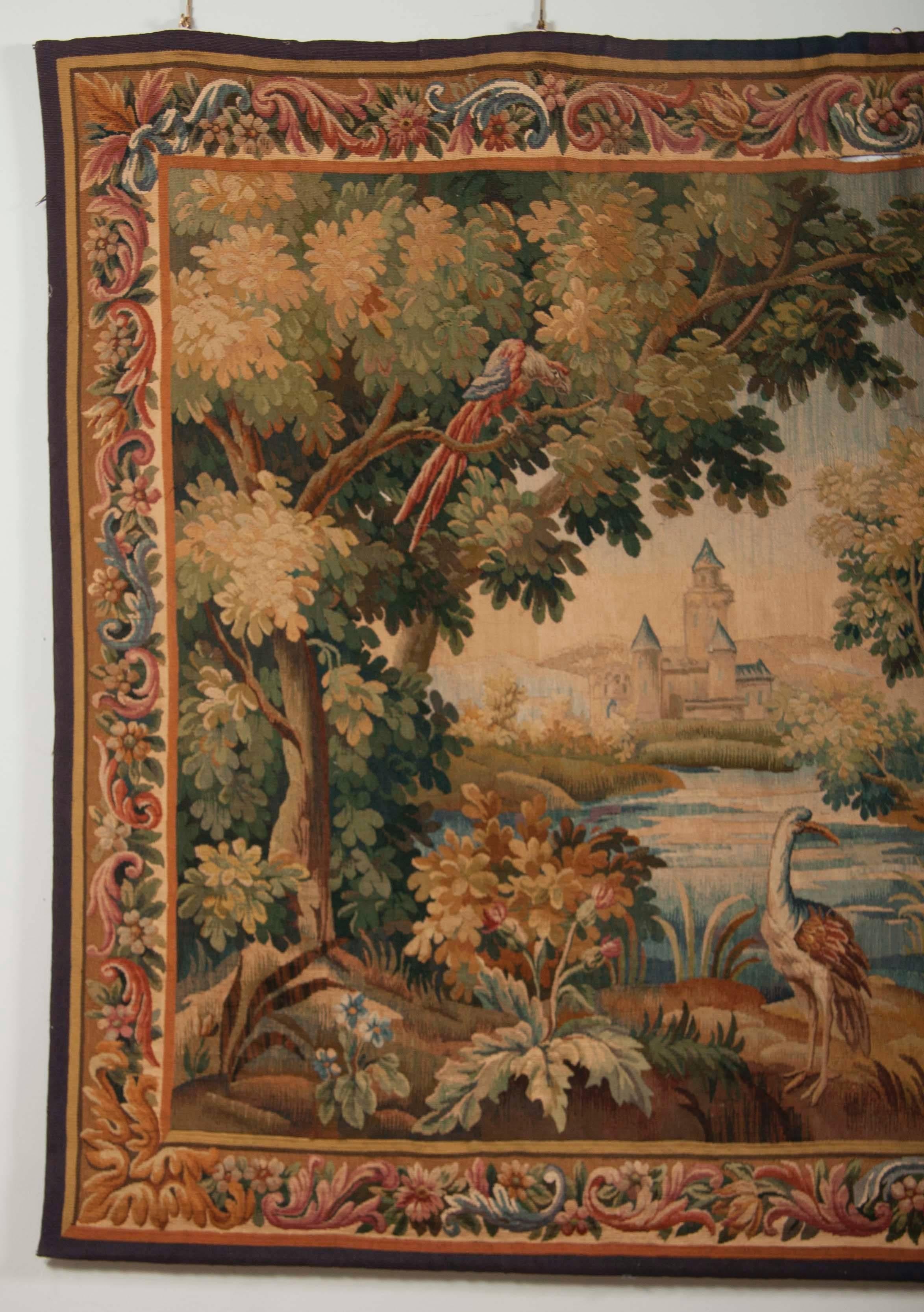 A French Aubusson tapestry with a pastoral landscape scene, in excellent condition from the late 18th or early 19th century.