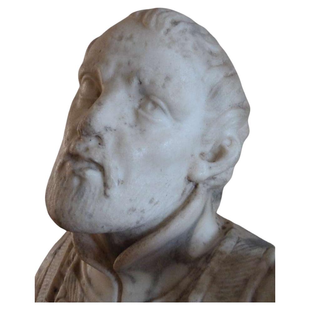 Scultura in marmo della fine del XVII secolo raffigurante un santo, forse dell'Italia centrale. Monogrammato sulla base di marmo 