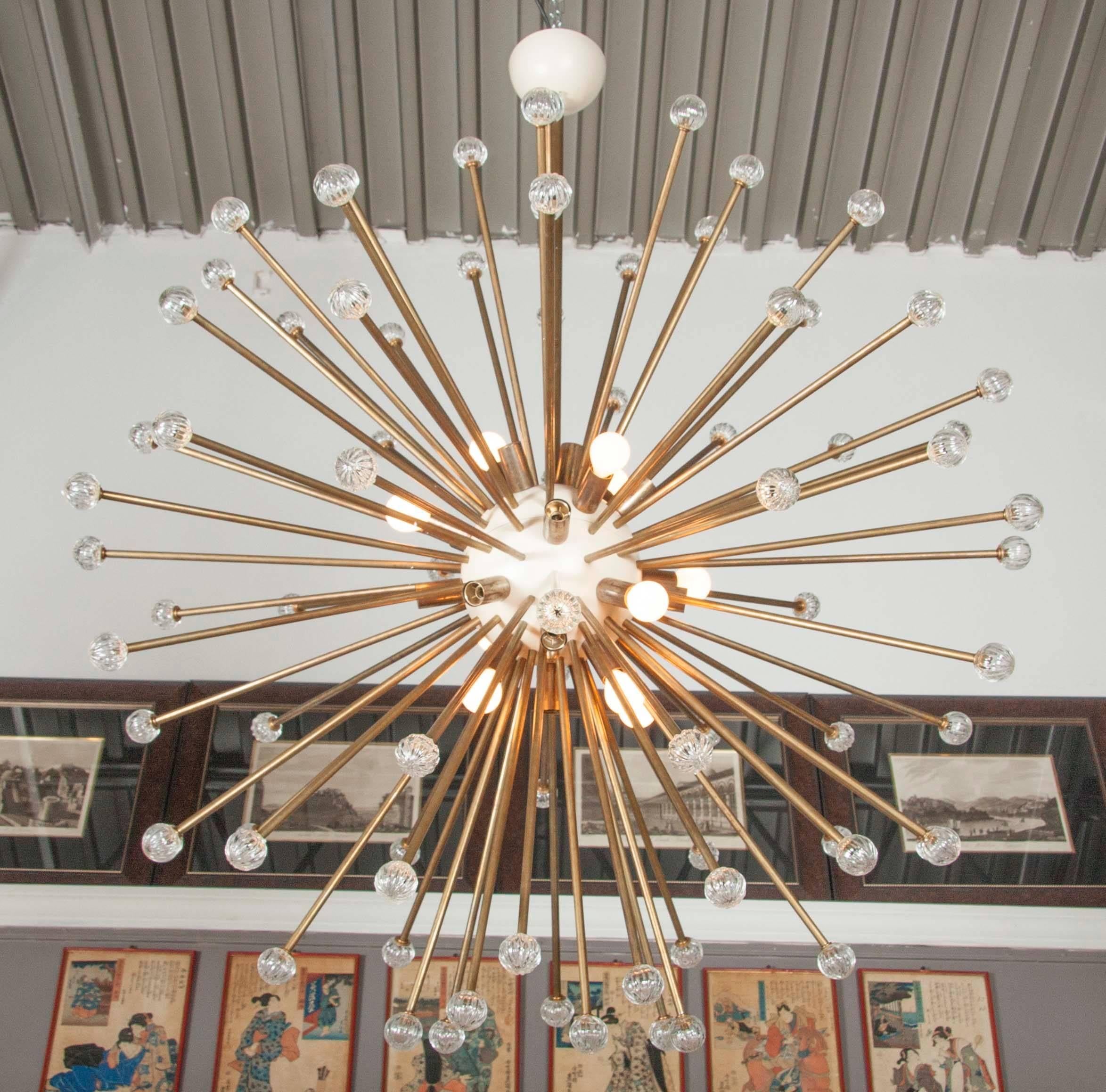 A Mid-Century Modern Italian antique brass Sputnik chandelier.