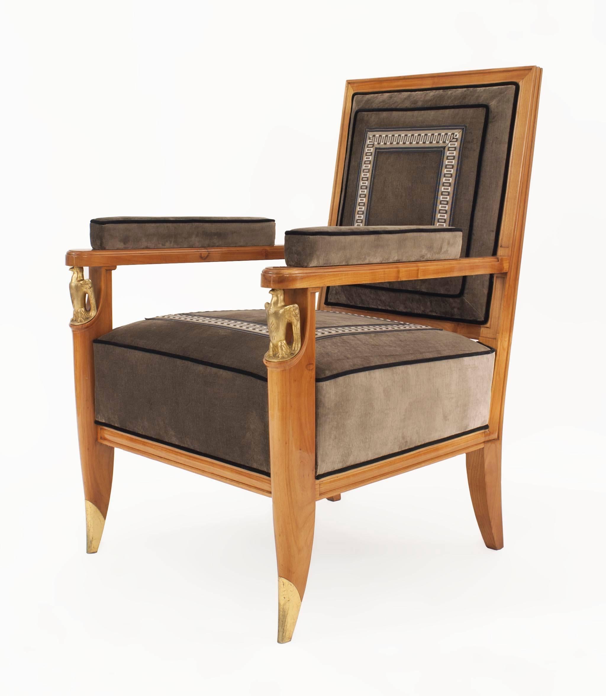 French mid-century light mahogany armchair with gilt bronze sabot feet and armrest supported by gilt bronze eagles with brown upholstery.  Signed by Vadim Androusov for Jean Pascaud (ref: Les Decorateurs des annee 40, pg 172).


Jean Pascaud was
