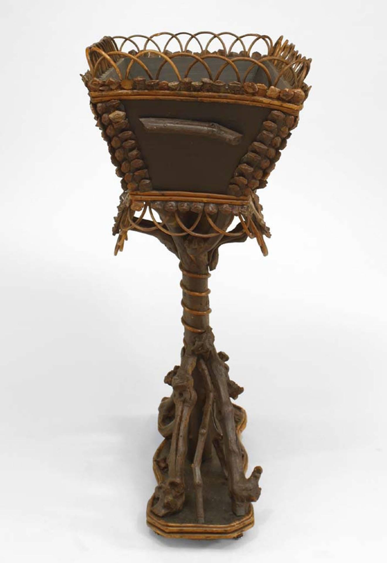 Rustic Continental (19th Cent) twig and root rectangular top fernery with filigree gallery on pedestal base with applied decoration.
