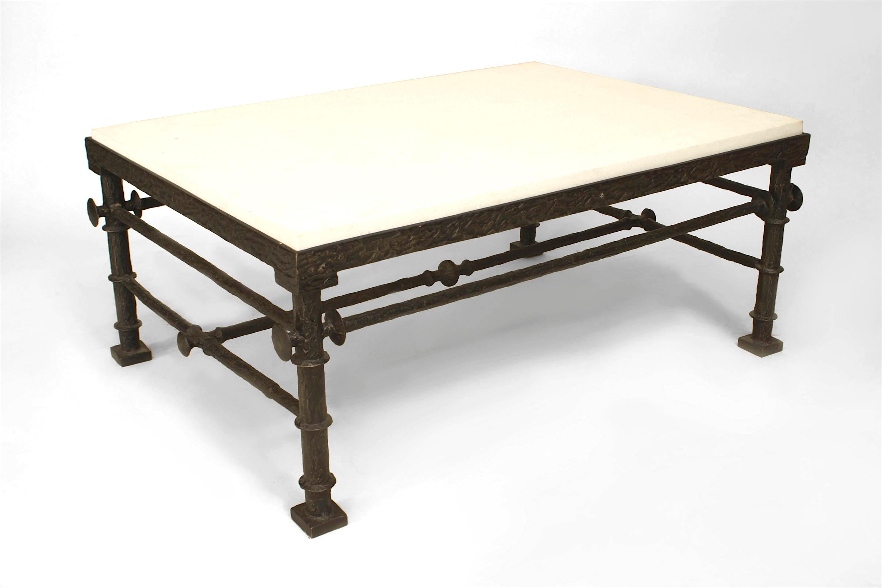 French Modern Grecian-style textured dark patinated bronze coffee table with double stretcher sides and a limestone top. (manner of ALBERTO GIACOMETTI)
