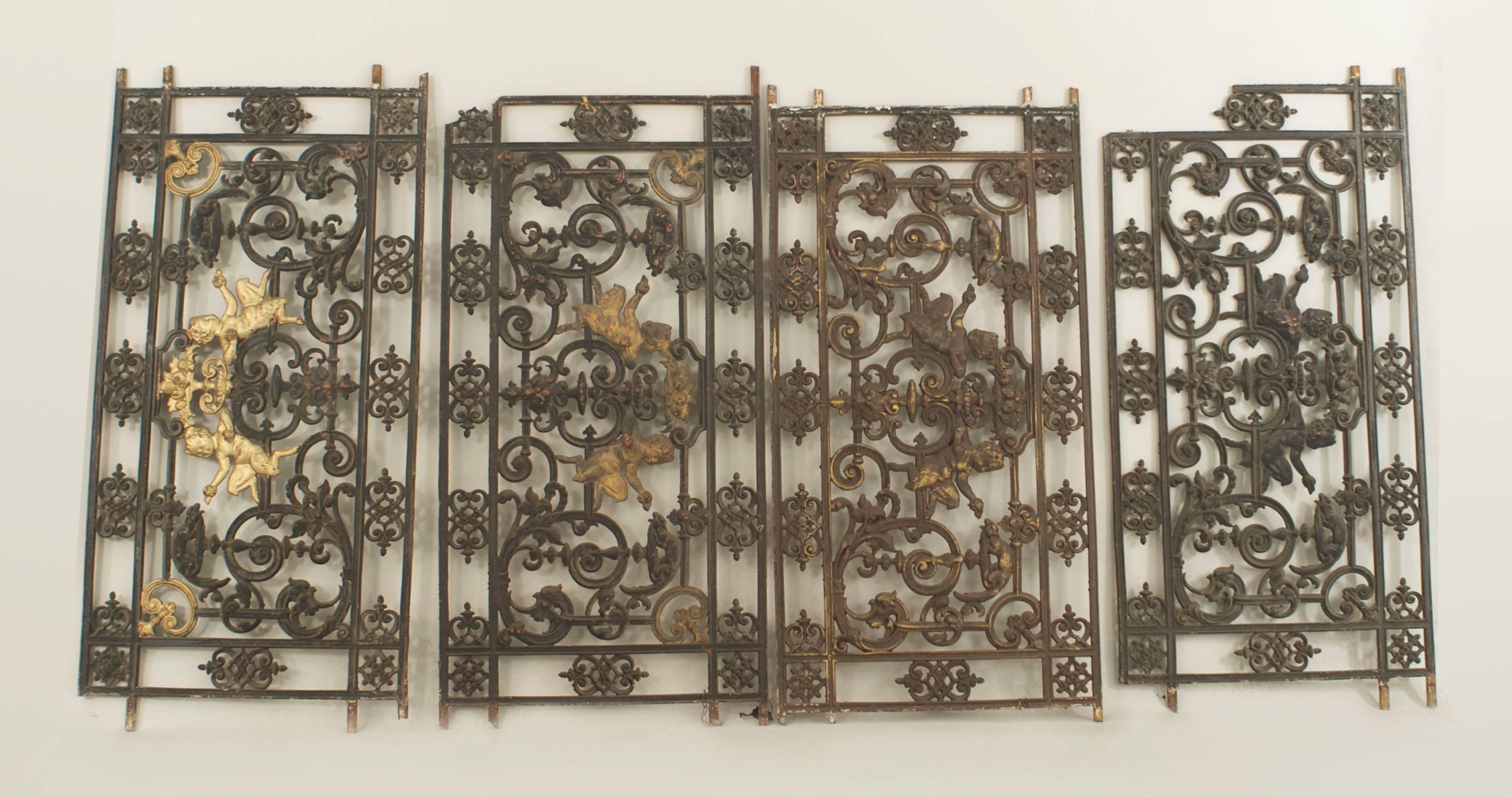 Four 19th century Italian Neoclassical style low iron railings cast with filigree and putti designs. 
(priced each)