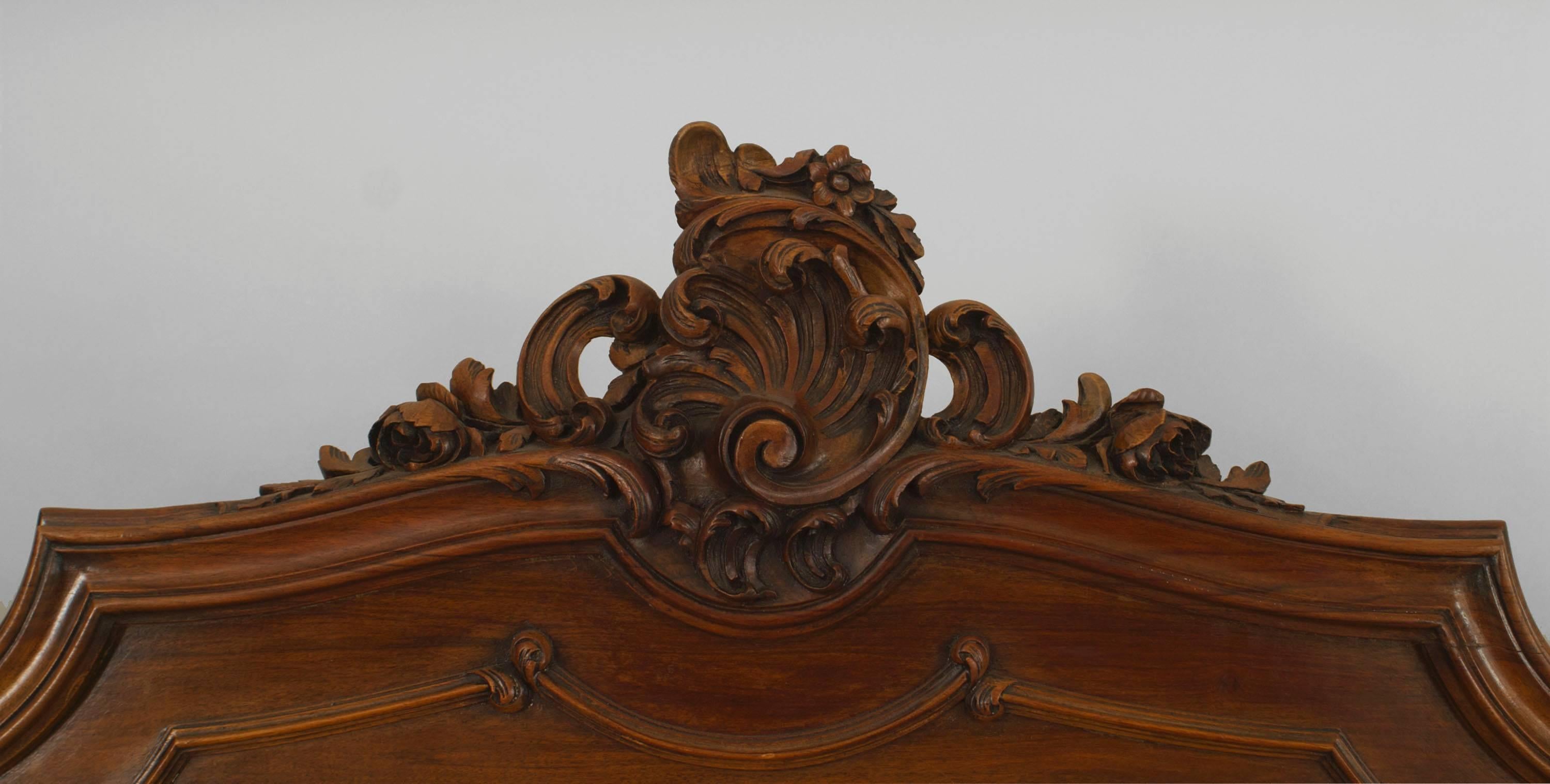 French, Louis XV provincial style walnut full-size bed with shell carving.
Headboard, footboard, rails, 19th-20th century.