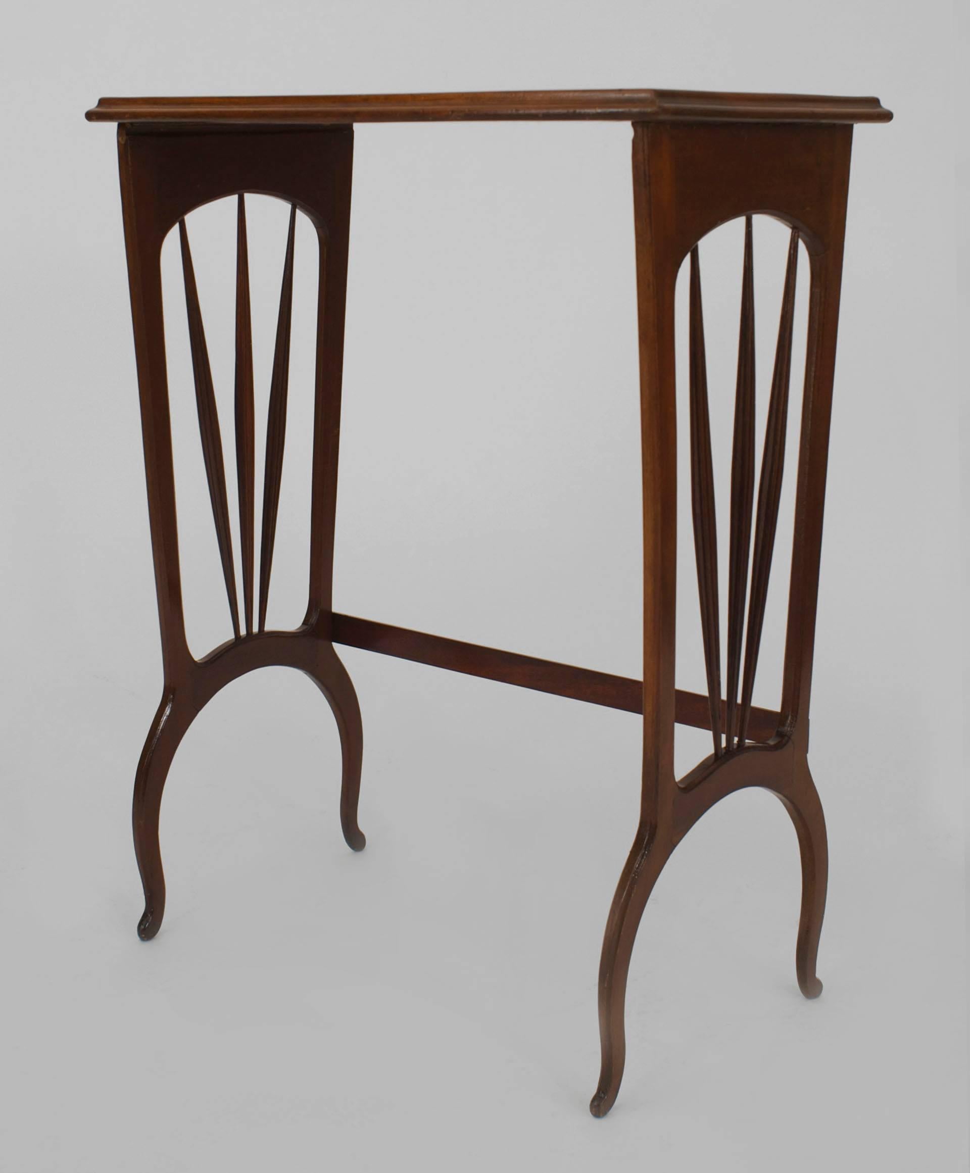 French Art Nouveau walnut rectangular nest of three tables with floral inlaid design tops and three side spindles connected to a stretcher (signed MAJORELLE).
