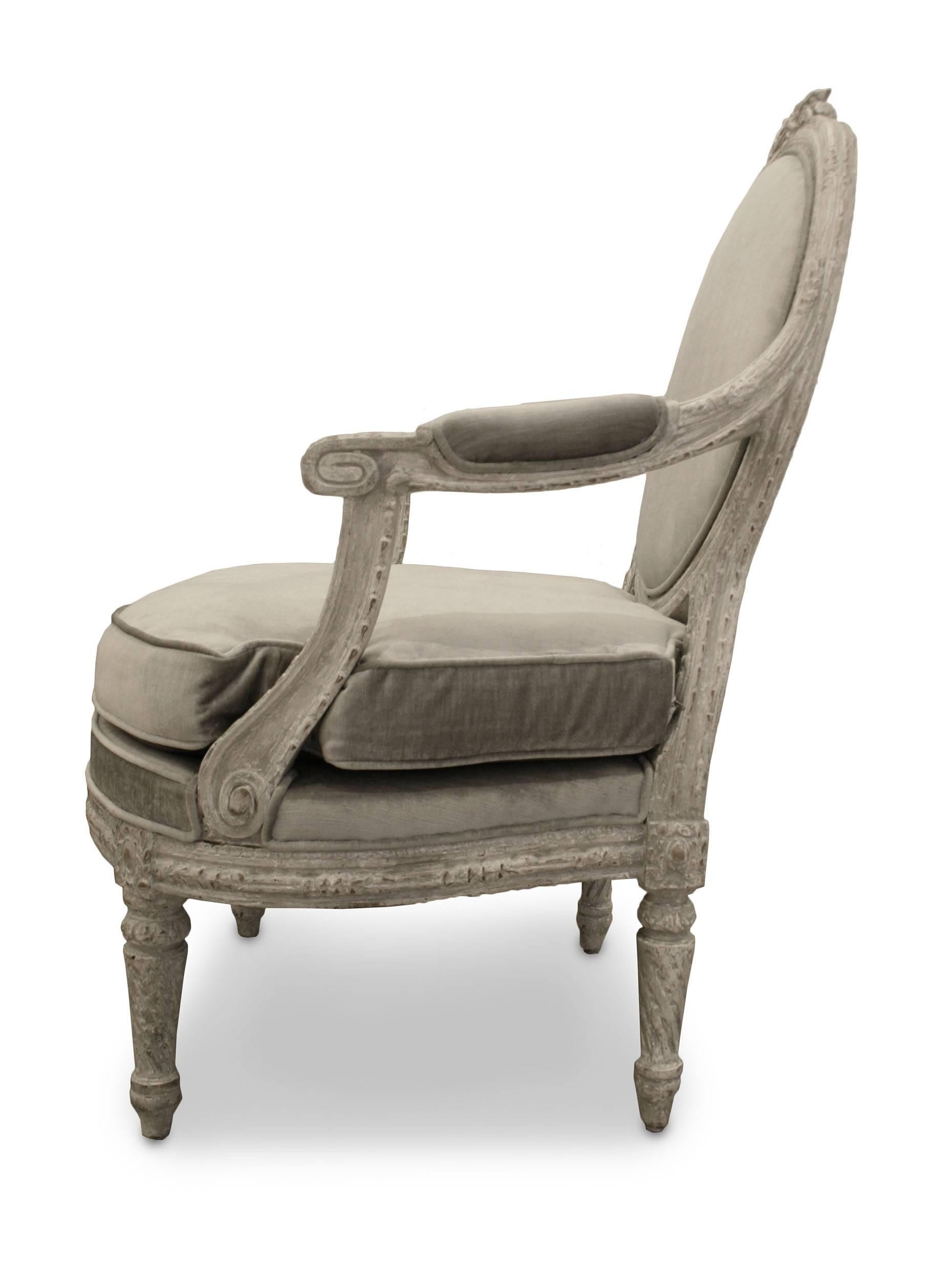 Pair of Italian Piedmontese (circa 1785) open-armchairs with a rounded back having a carved floral crest, the frame carved with wheat, and the legs having a twisted fluting.