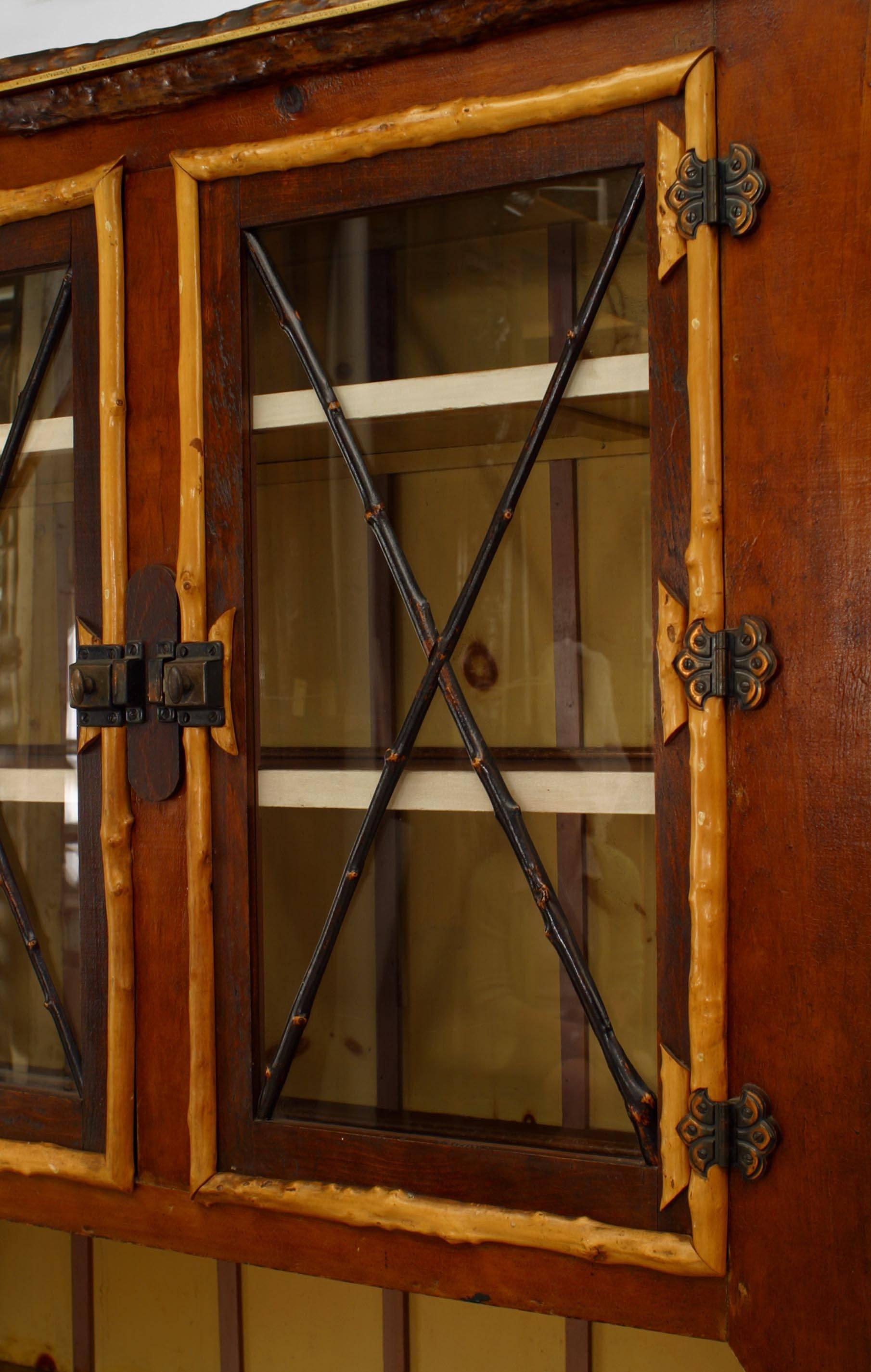 American Rustic Adirondack-style (19/20th Century) painted 4 door cupboard cabinet with twig and various wood decoration with 2 glass doors
