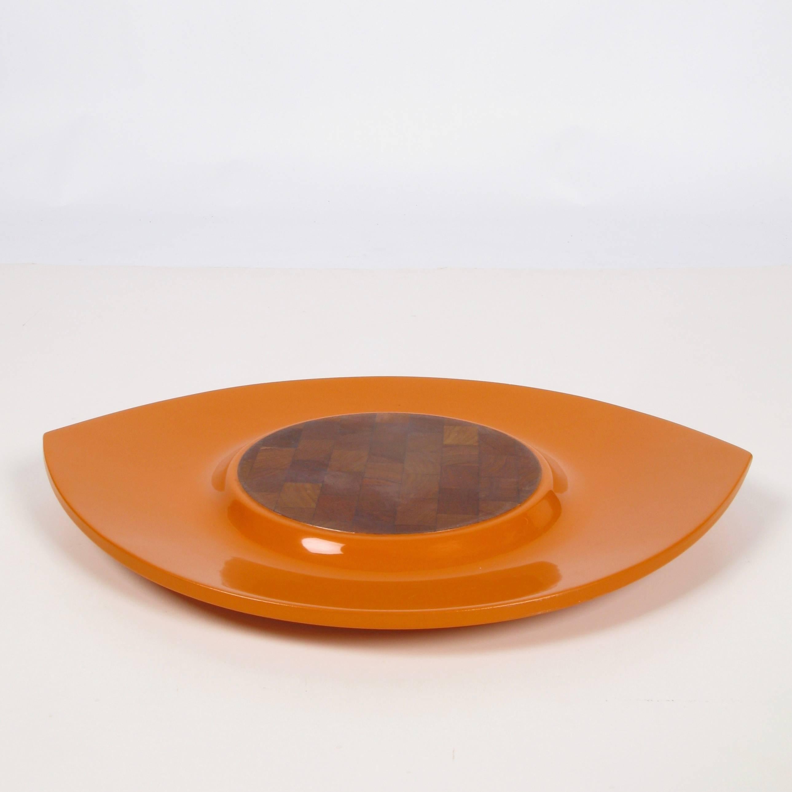 Lacquered tray with teak center designed by Jens Quistgaard for his Festivaal line for Dansk. This rare tray is in excellent condition with only minor scuffs on the edge. Made in Denmark.