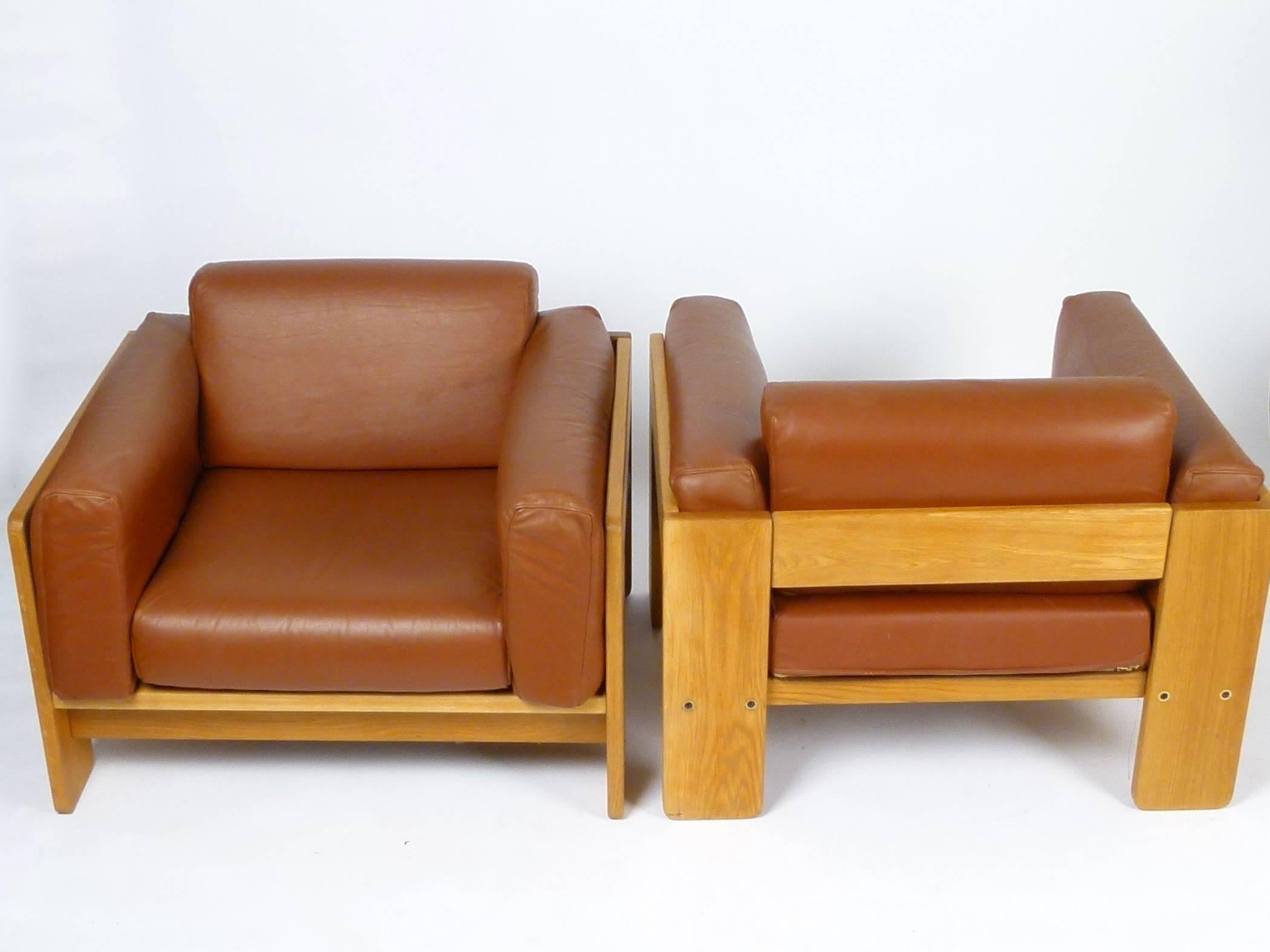 Pair of iconic 1970s leather and oak 