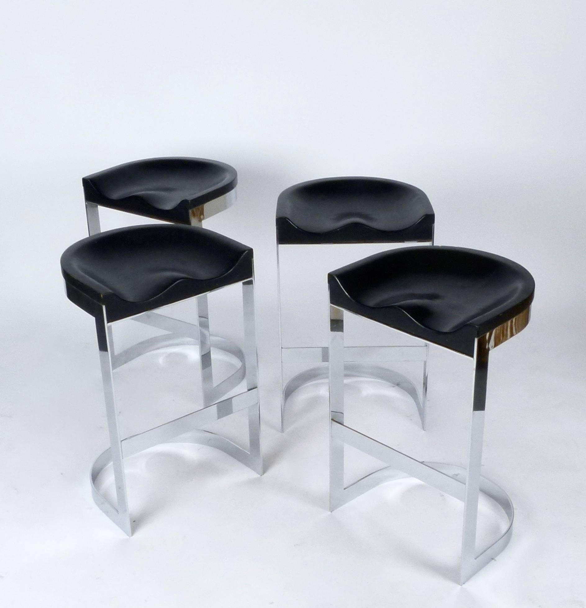 Cantilevered counter height bar stool with solid chromed steel base and leather wrapped sculpted seats designed by Warren Bacon, 1970s. Two available, priced separately.