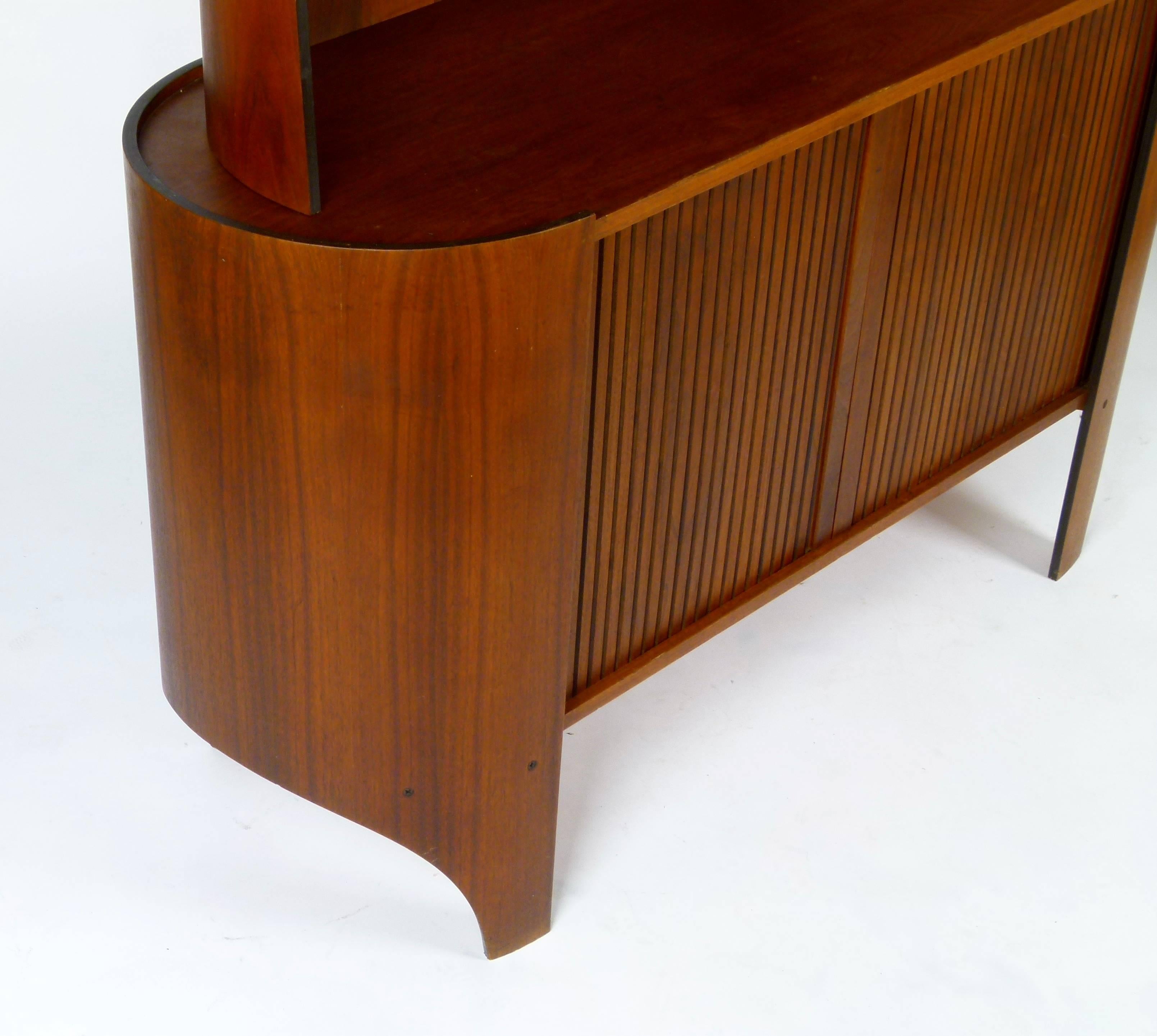 1960s sculptural display cabinet in walnut designed by Henry Glass for his 