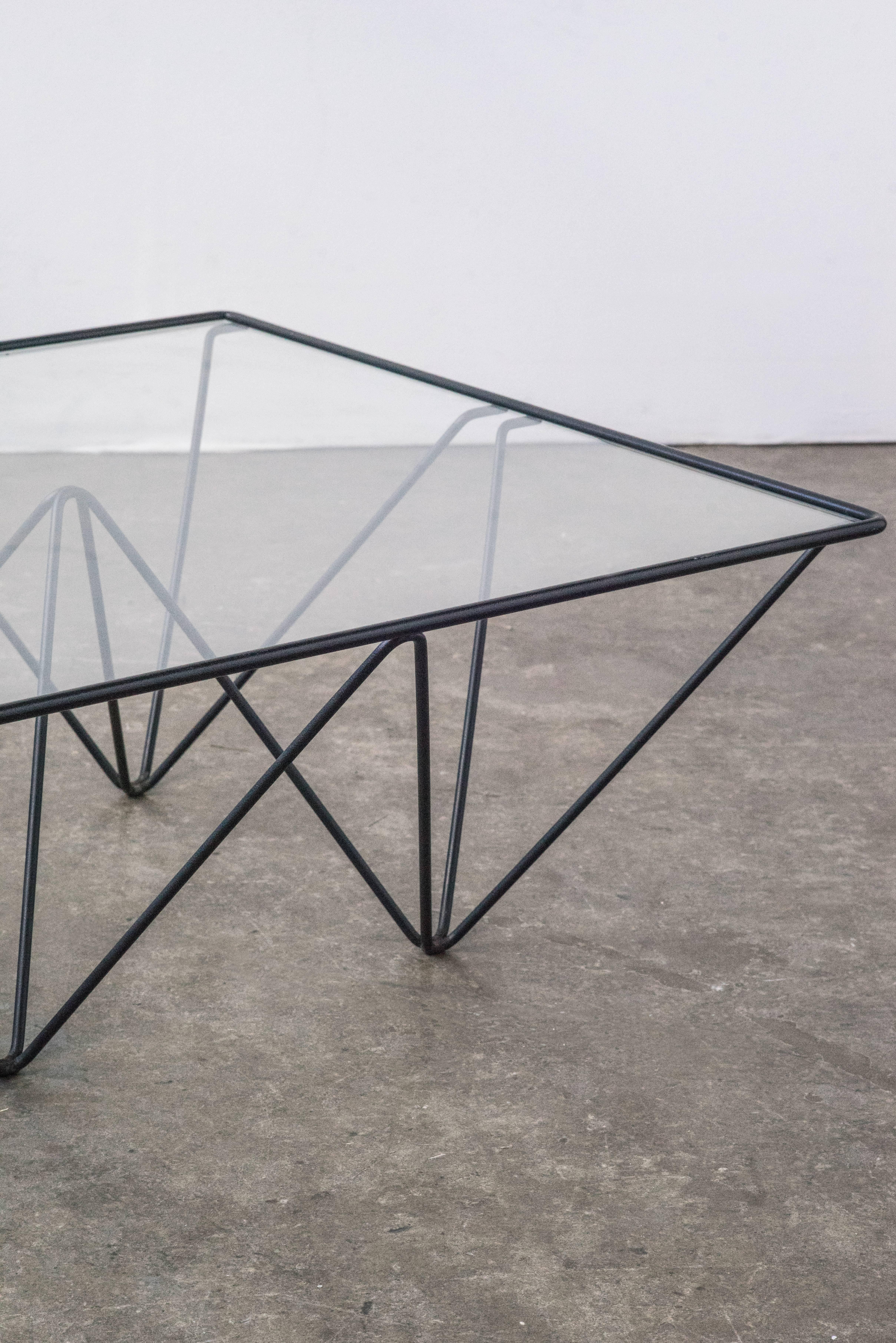 The iconic wireframe cocktail table in the style of Paolo Piva. Glass is Italian and appears to be original but in excellent condition.
