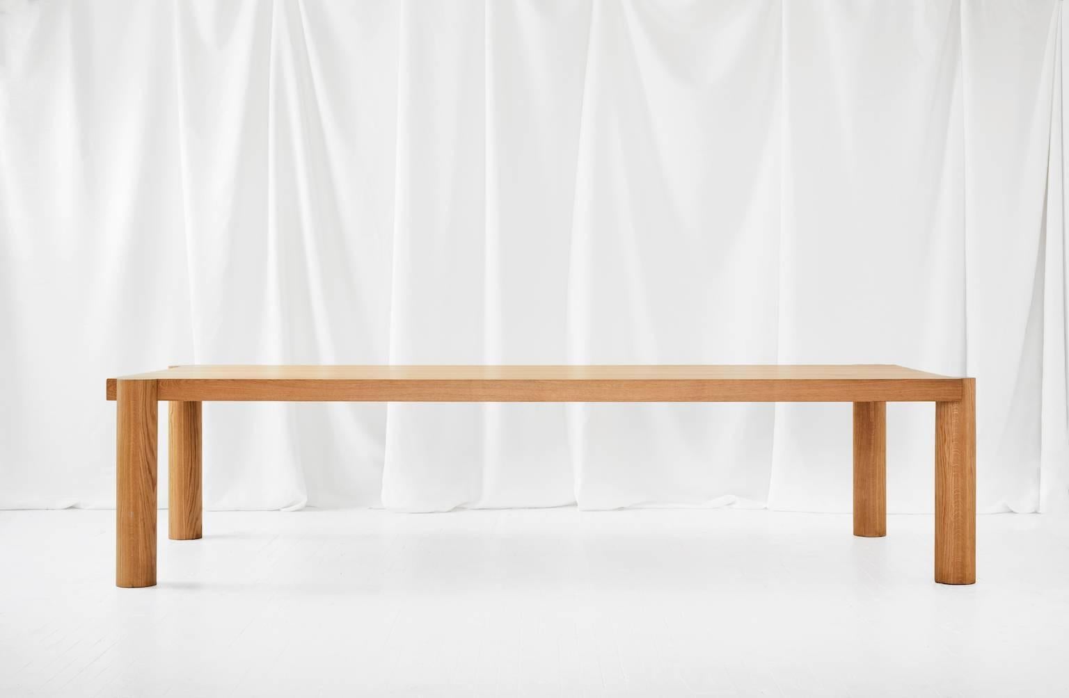 Built entirely of solid oak, this massive yet minimal dining table is enough to seat ten comfortably. Extremely simplistic lines balance the size of this dining table and join together to create a beautiful yet masculine form.

Available finishes: