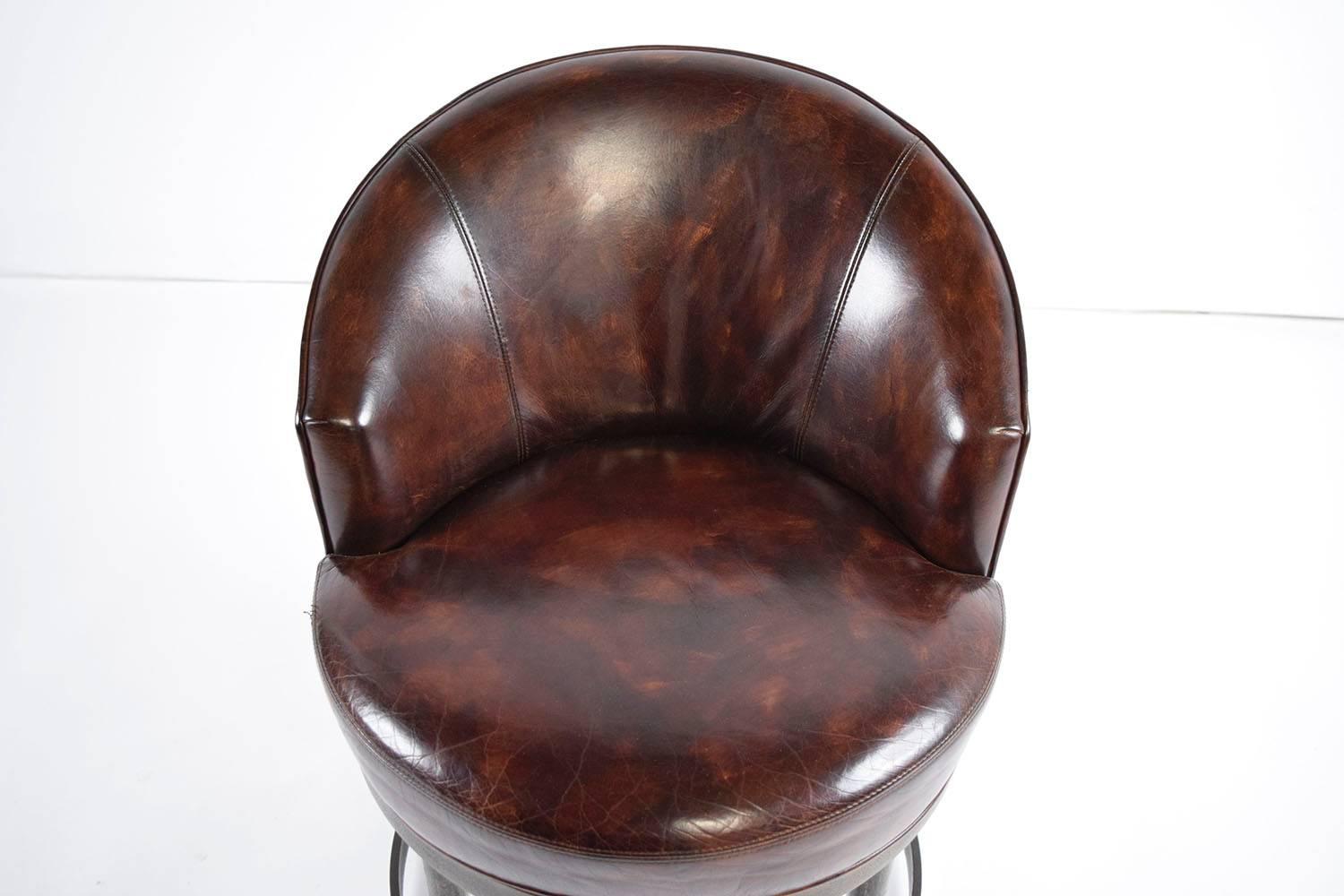North American Pair of Vintage Leather Swivel Chairs