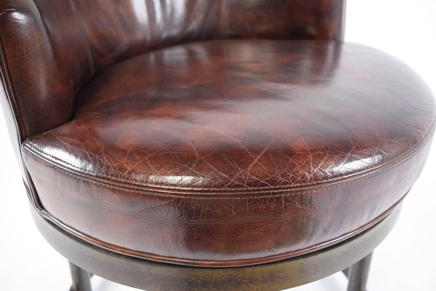 Gilt Pair of Vintage Leather Swivel Chairs