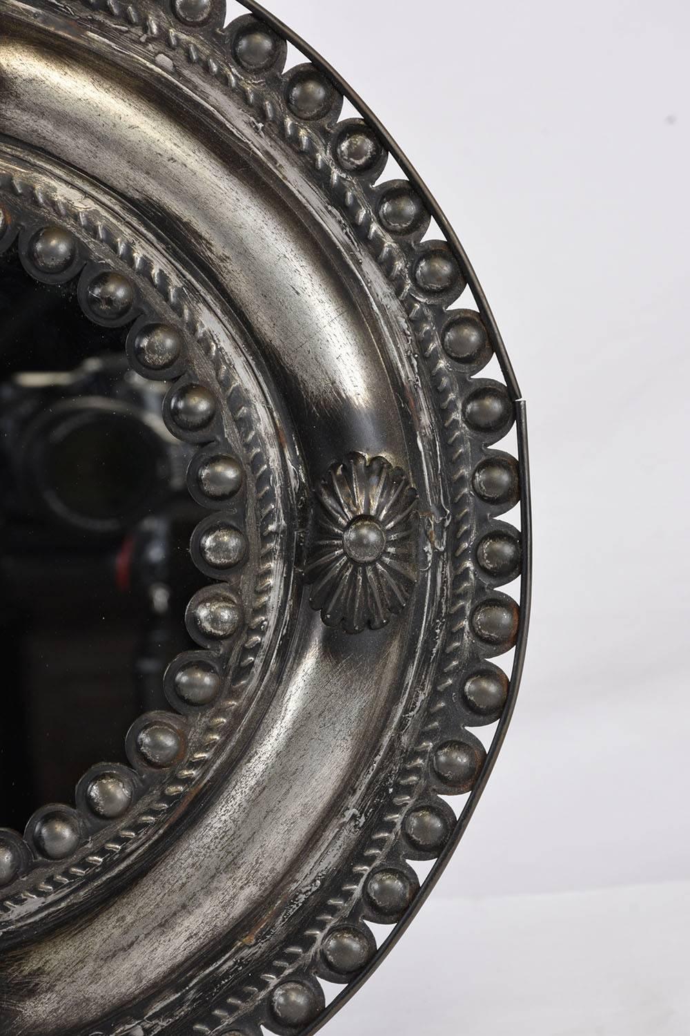 Polished Pair of Louis XVI-Style Pressed Metal Mirrors