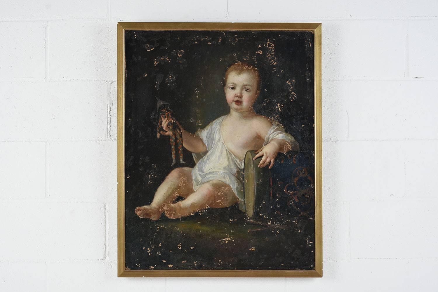 This early 1800s Baroque-style oil painting depicts a portrait of a child playing with toys. The red haired child is clothed in a piece of fabric that drapes over its shoulder and rests in its lap. The child is seated leaning on a toy drum. In the