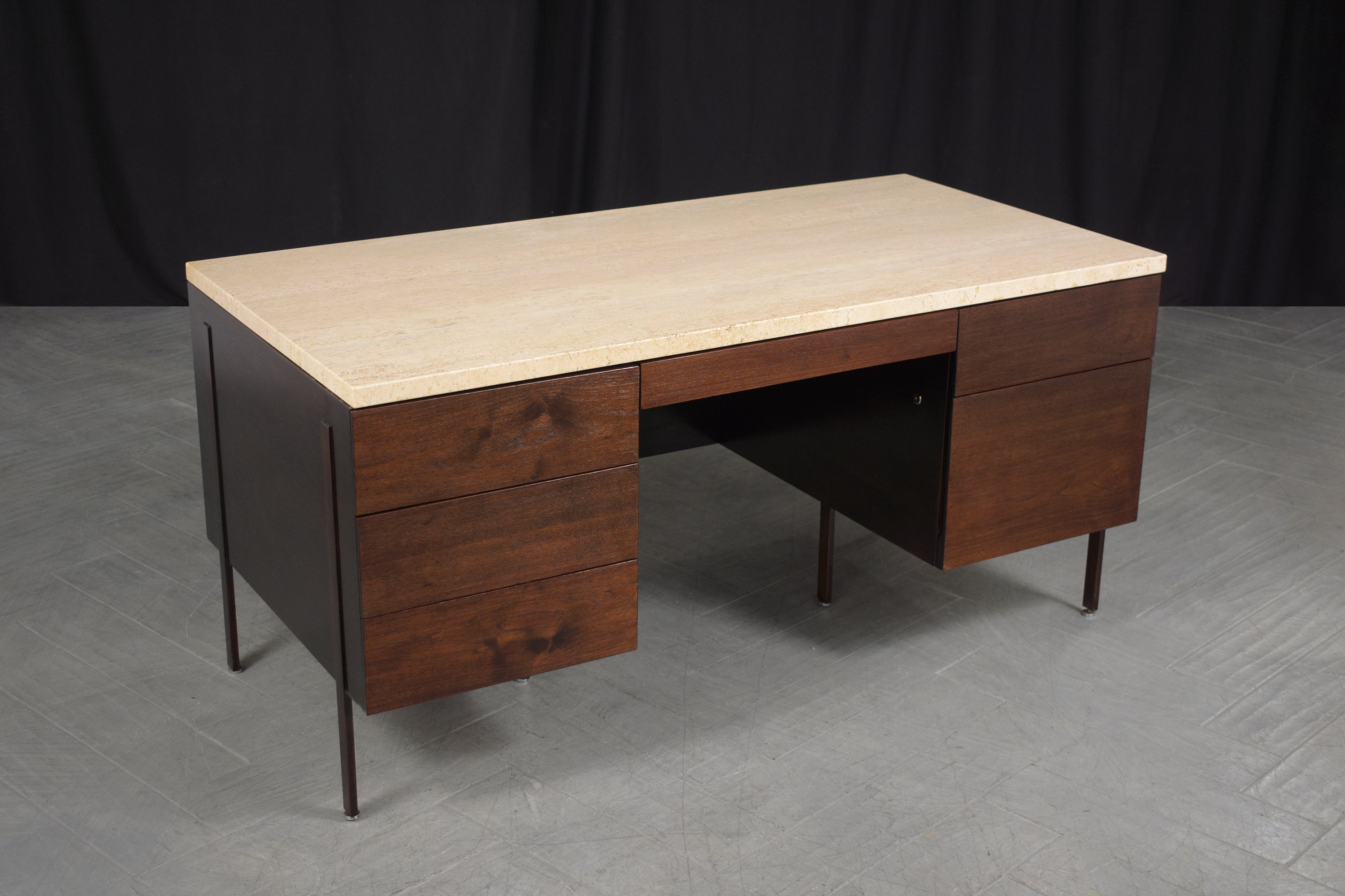 Experience the sophistication of the 1960s with our beautifully restored Harvey Probber Mid-Century Modern Executive Desk. Crafted from the finest mahogany, this desk exemplifies the era's design ethos and superior craftsmanship, ensuring both