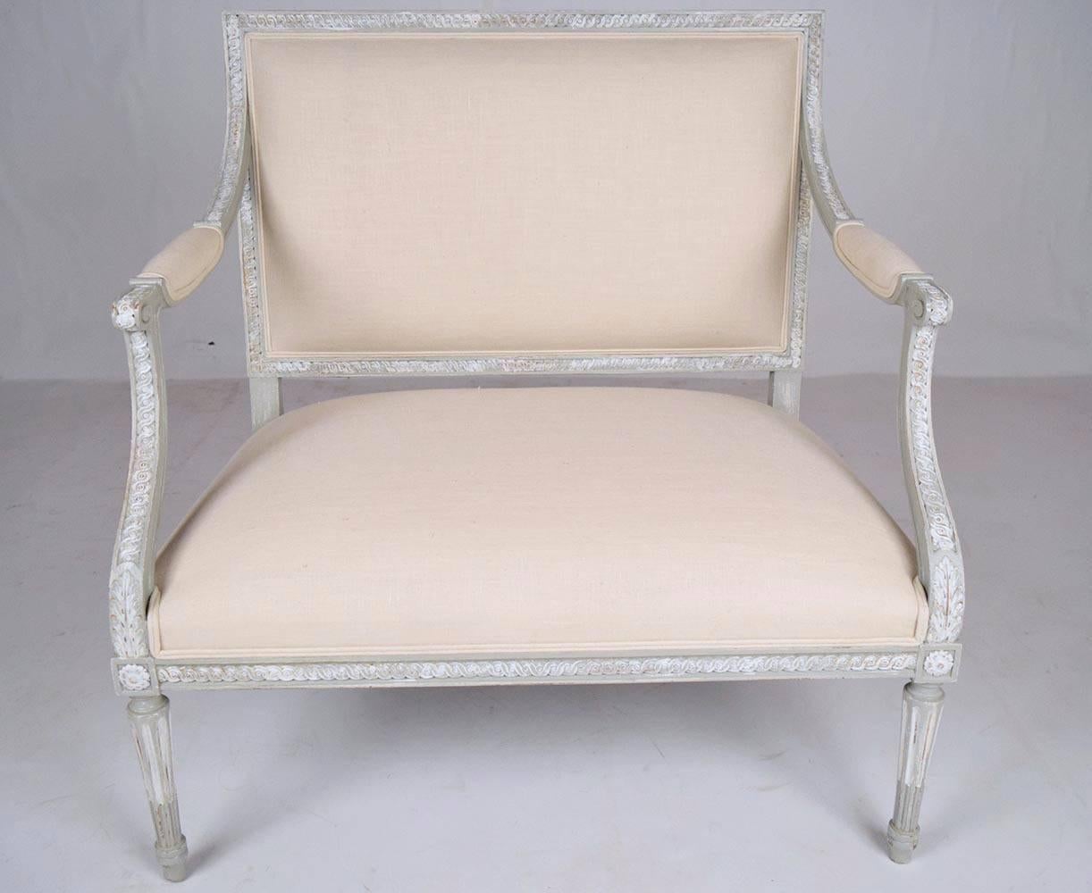 Carved Pair of Antique French Louis XVI Wide Seat Arm Chairs