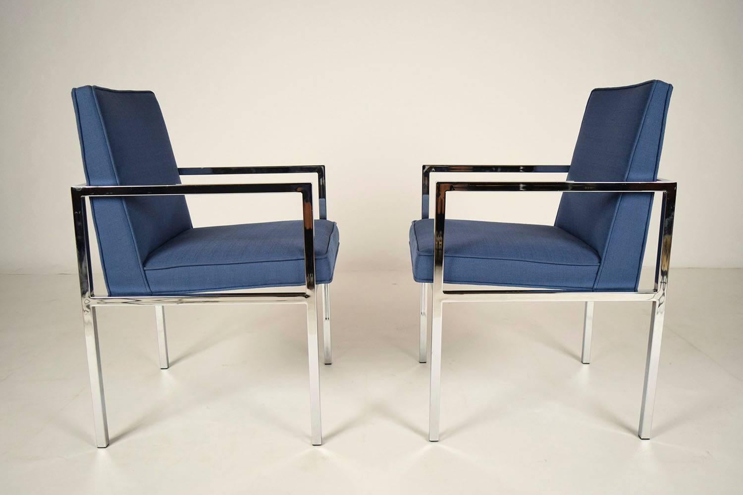 Pair of 1970s armchairs. Solid steel frames, with a bright chrome finish. They have been professionally upholstered in blue fabric, with single piping trim. Chairs are solid and sturdy, very comfy ready to be used.
Measures: Arm height 24