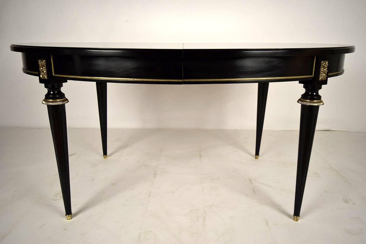 French Louis XVI-style Ebonized Oval Dining Table In Excellent Condition In Los Angeles, CA