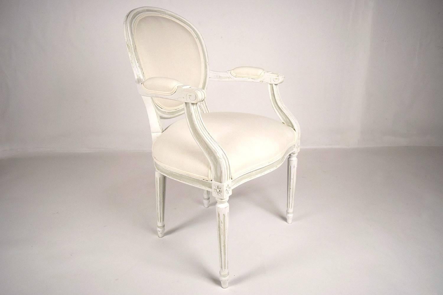 Fabric Pair of Painted French Louis XVI Style Armchairs