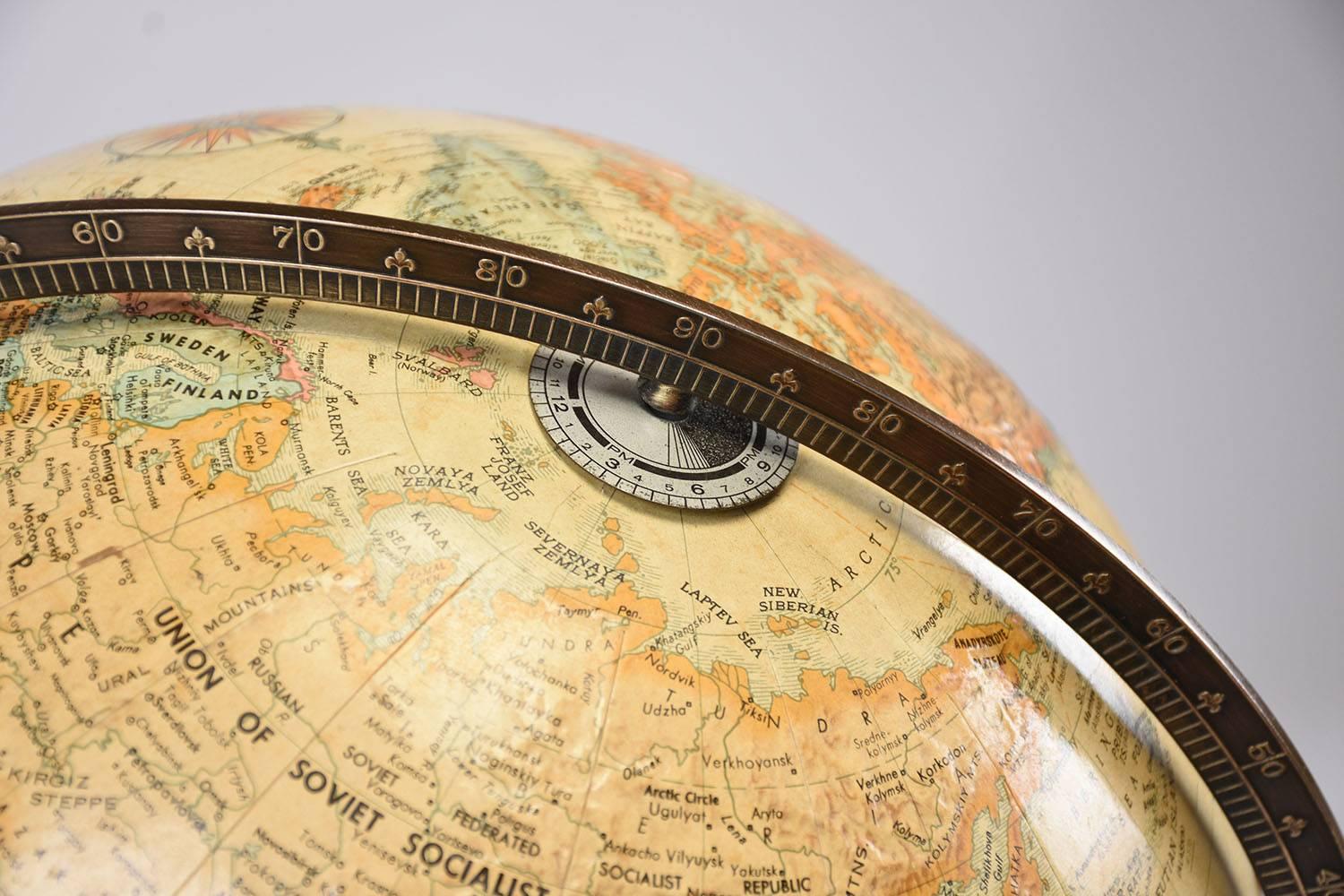 This Replogle "World Classic" series standing globe dates back to 1990 and is attributed to Paul McCobb. The rotating globe is in great condition with only minor wear to the map itself. The three pole base is circular and very sturdy. This