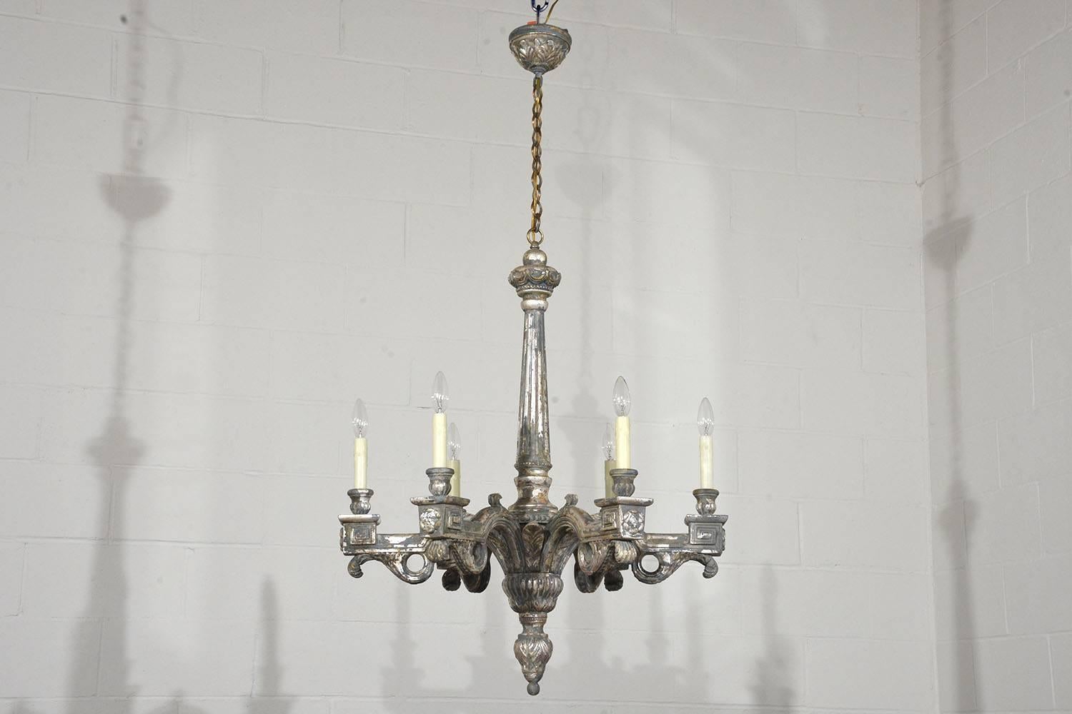 Pair of Six-Light Italian Neoclassical-Style Silver Leaf Carved Wood Chandeliers In Excellent Condition In Los Angeles, CA