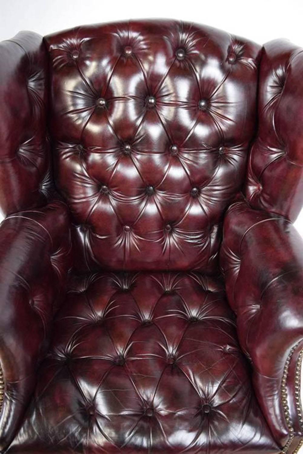 Pair of Chesterfield Tufted Leather Wingback Chairs In Excellent Condition In Los Angeles, CA