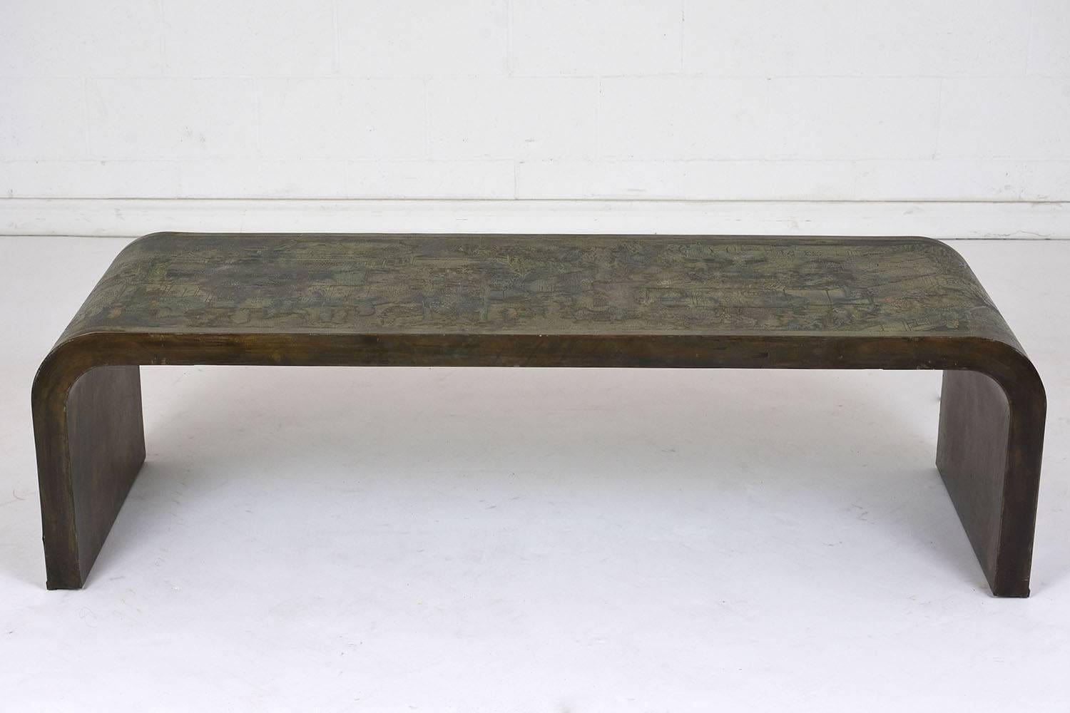This 1960s Modern-style coffee table is signed and designed by Philip Kelvin Laverne. The coffee table is made of bronze with a flat finish. The simplicity of the curved edges and unique profile are accented by the different colors found in the
