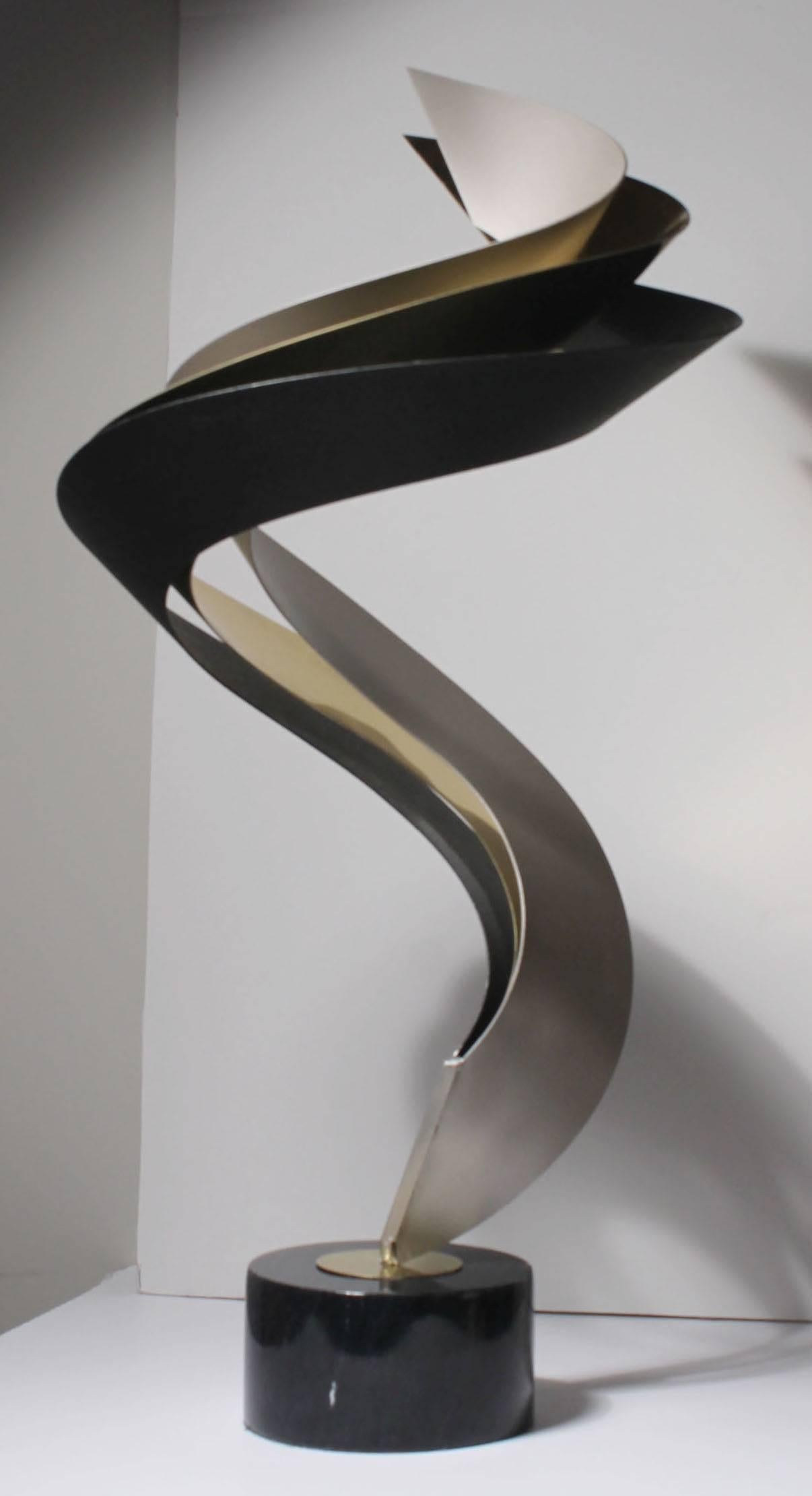 Elegant Jere table art sculpture
Comprised of three metal finishes. Black, brass and mat silver.
Marble base.
Signed and dated (1993) on the base.

Dimension are approximately please confirm if exact dims are desired.
 