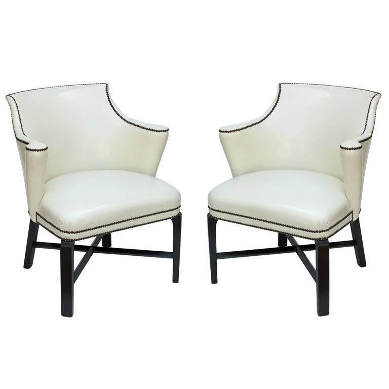 Syrie Maugham specified these chair more than once for her interiors. Uncertain if she designed them as well. Possibly. In the manner of Tommi Parzinger

 These were reupholstered somewhat incorrectly at a later date. The nailheads were not