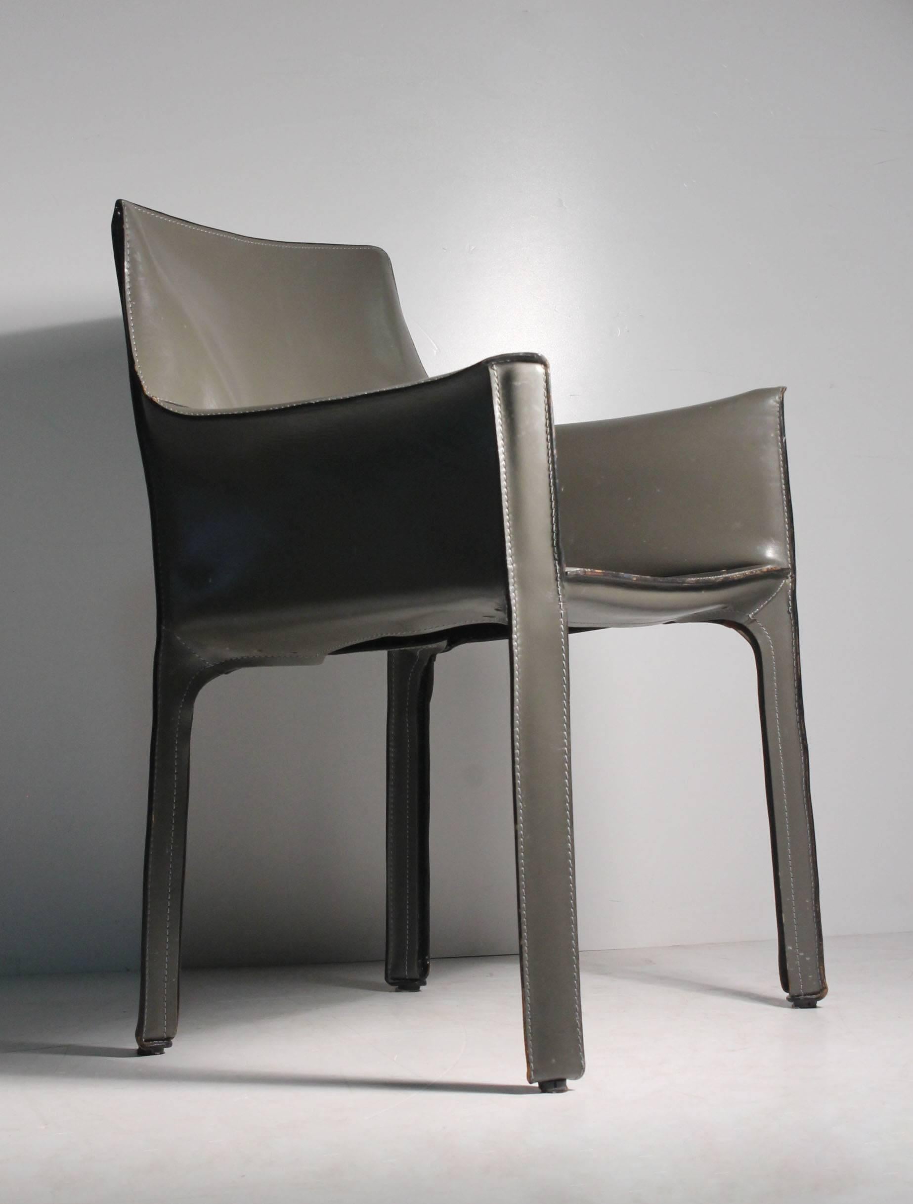 Mario Bellini cab chairs, set of six, Cassina Italy, leather over steel.
Not often found in this designer color warm grey.

Nice vintage condition. Leather overall looks pretty nice. Please request detail photos.

The bottom plastic shells are