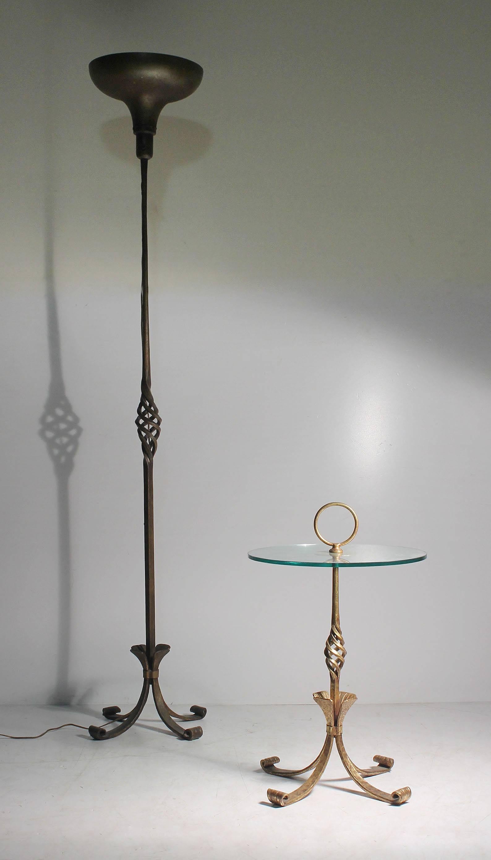 Erwin Gruen Hand-Forged Wrought Iron Gilded Torchere Floor Lamp. In the manner of French 40's wrought iron design such as Gilbert Poillerat and Raymond Subes.

Erwin Gruen, born in Berlin, Germany in 1918, renowned iron worker, Erwin Gruen