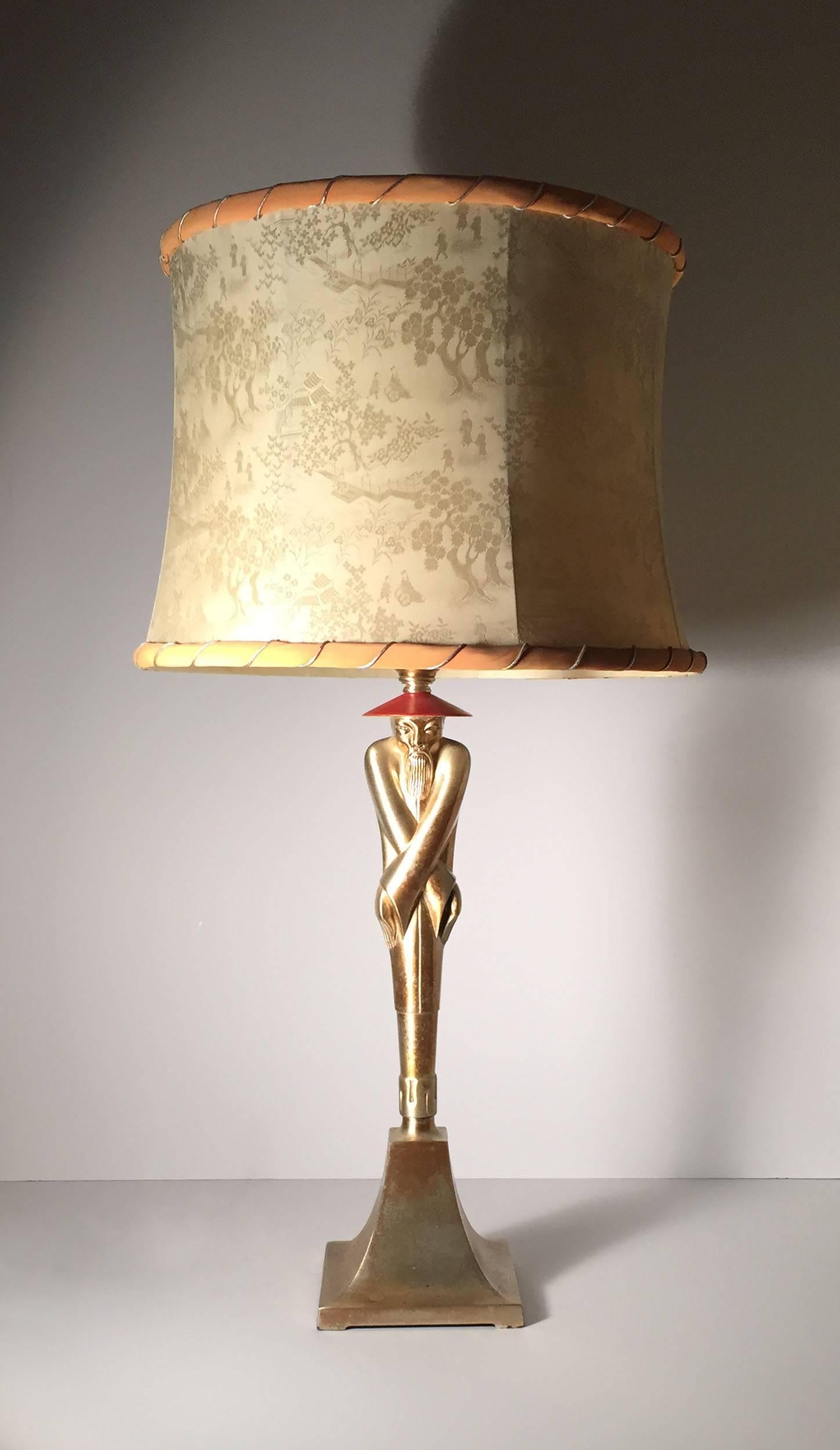 A period early pair of Viktor Schreckengost table lamps stylized in the asian / oriental taste. Come with rare original I believe silk shades. Tags attached to to the shades by Colonial Premier Co. Shades were recently damaged unfortunately.

Places