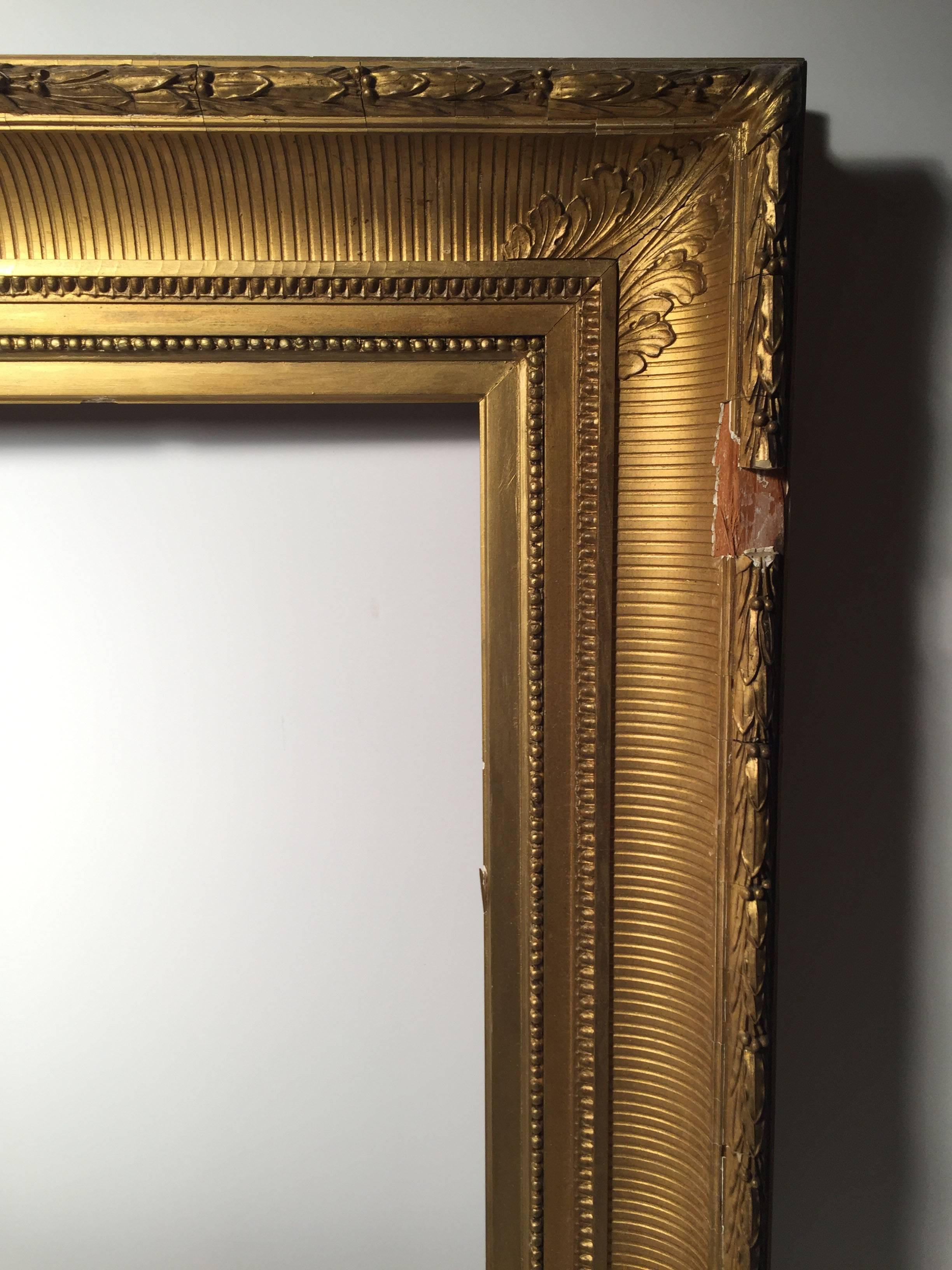 A nice early antique Hudson River School Design frame of quality construction and gilding. Large enough to make a nice wall mirror.

the opening inside is 13.5