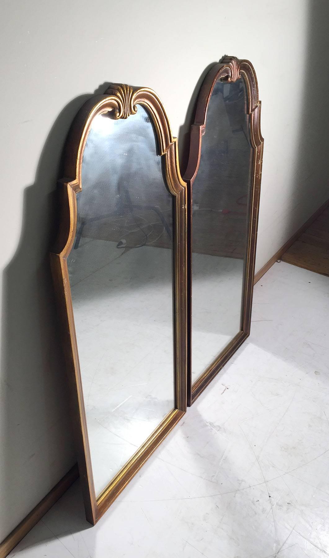 A nice Hollywood Regency matched form. Vintage 60's 70's. The gold finish on one is slightly darker than the other.  Possibly by La Barge

Gold painted / Gilt Mirrors. 