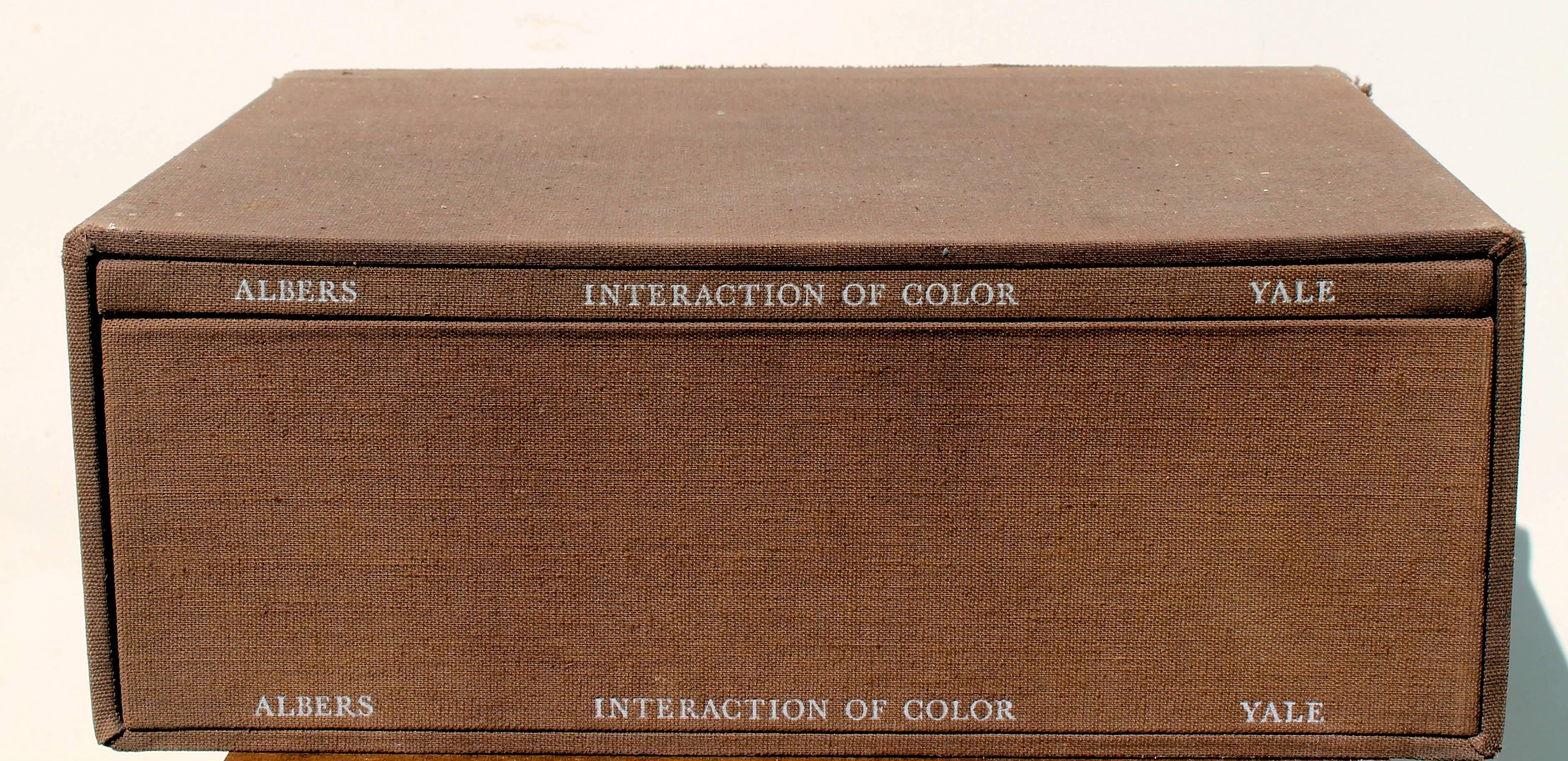 The seminal two volume work demonstrating Albers' complete teachings and ideas of color. Volume! is text and volume 2, 80 screen prints. Many of these prints have flaps. Cut-out overlays and other variables.