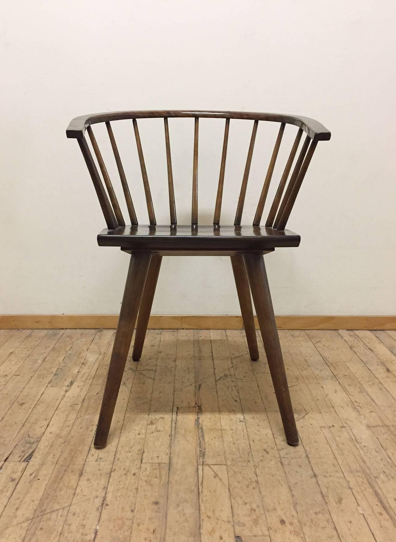 A good matched set of four American Windsor inspired chairs by Russel Wright for Conant Ball company. Signed to underside. Manner of Paul McCobb and George Nakashima. Wrights own take on it brings an adorable rounded 