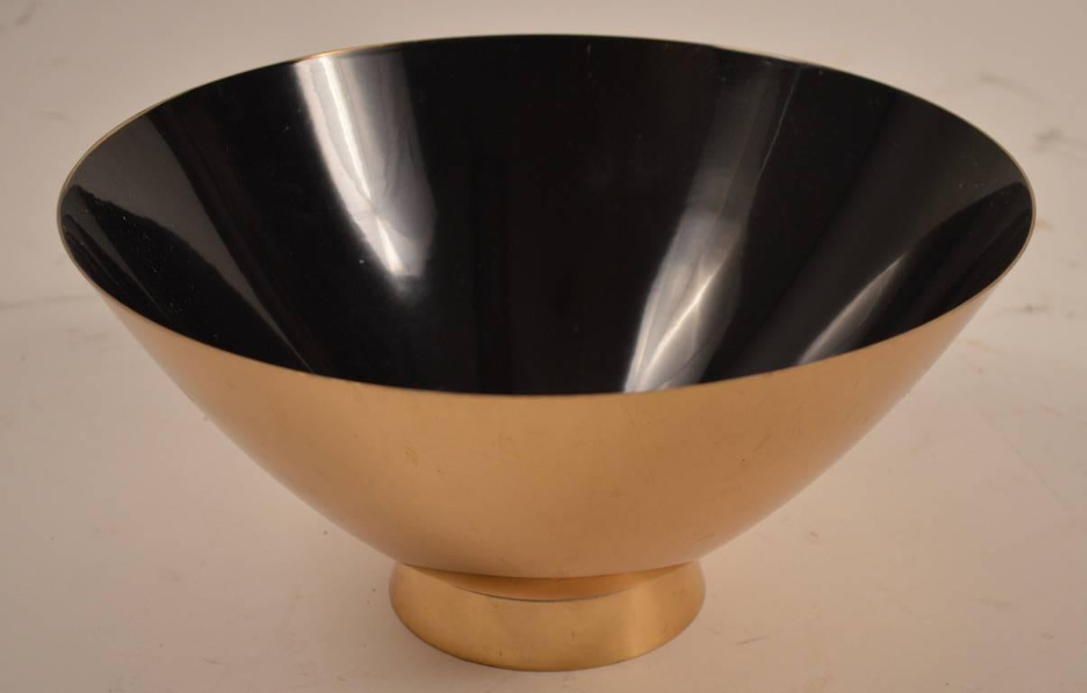 Wonderful Gorham bowl with gold colored exterior and black enamel interior. Designed buy Donald Colflesh for Gorham.